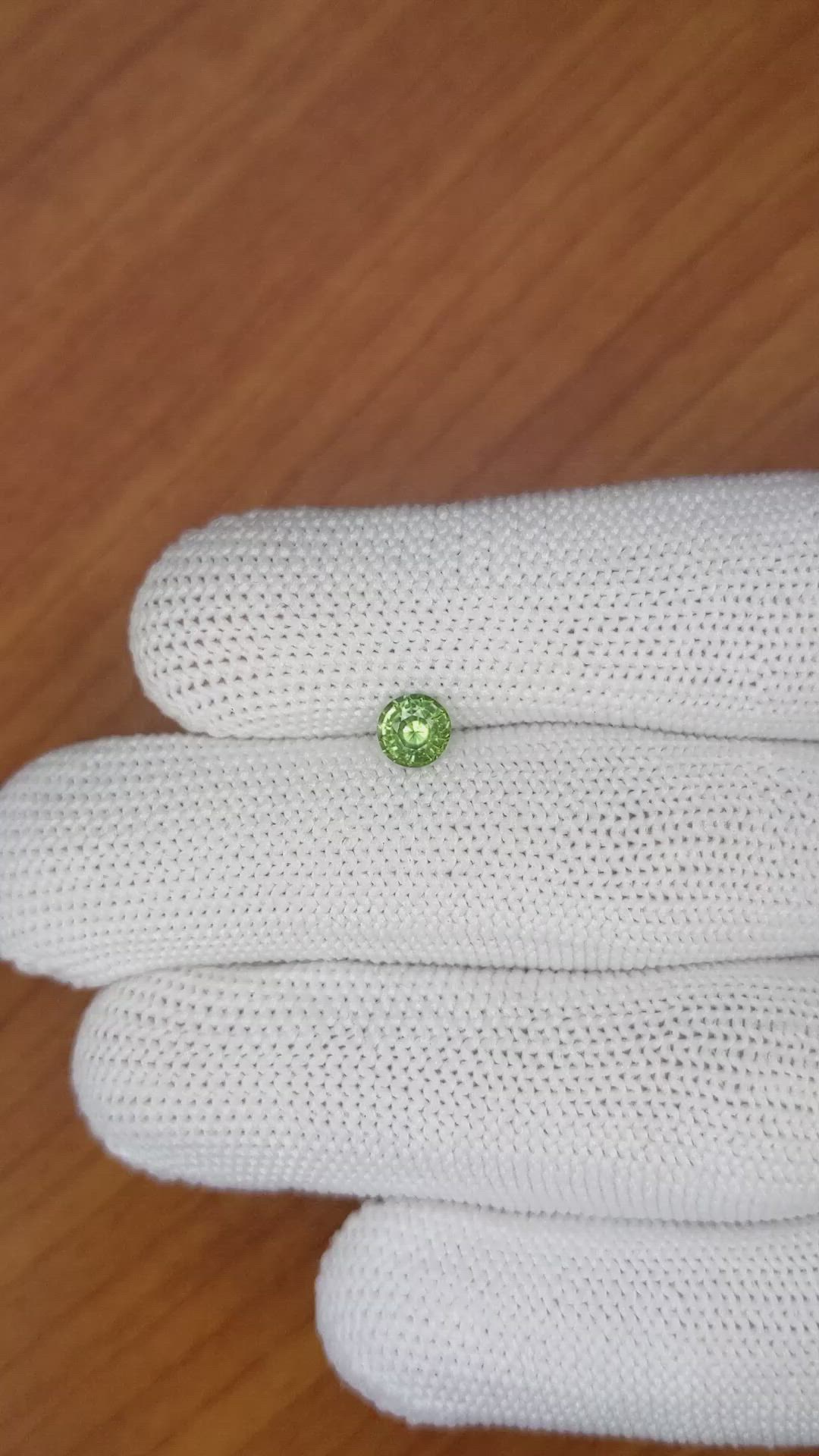 0.71 Ct. Yellowish Green Sapphire from Madagascar Size Video