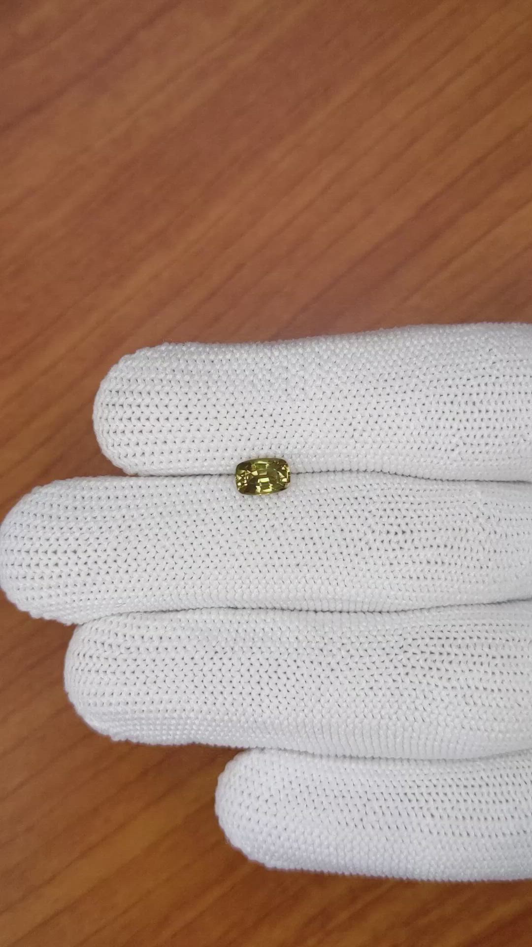 0.87 Ct. Yellowish Brown Sapphire from Madagascar Size Video