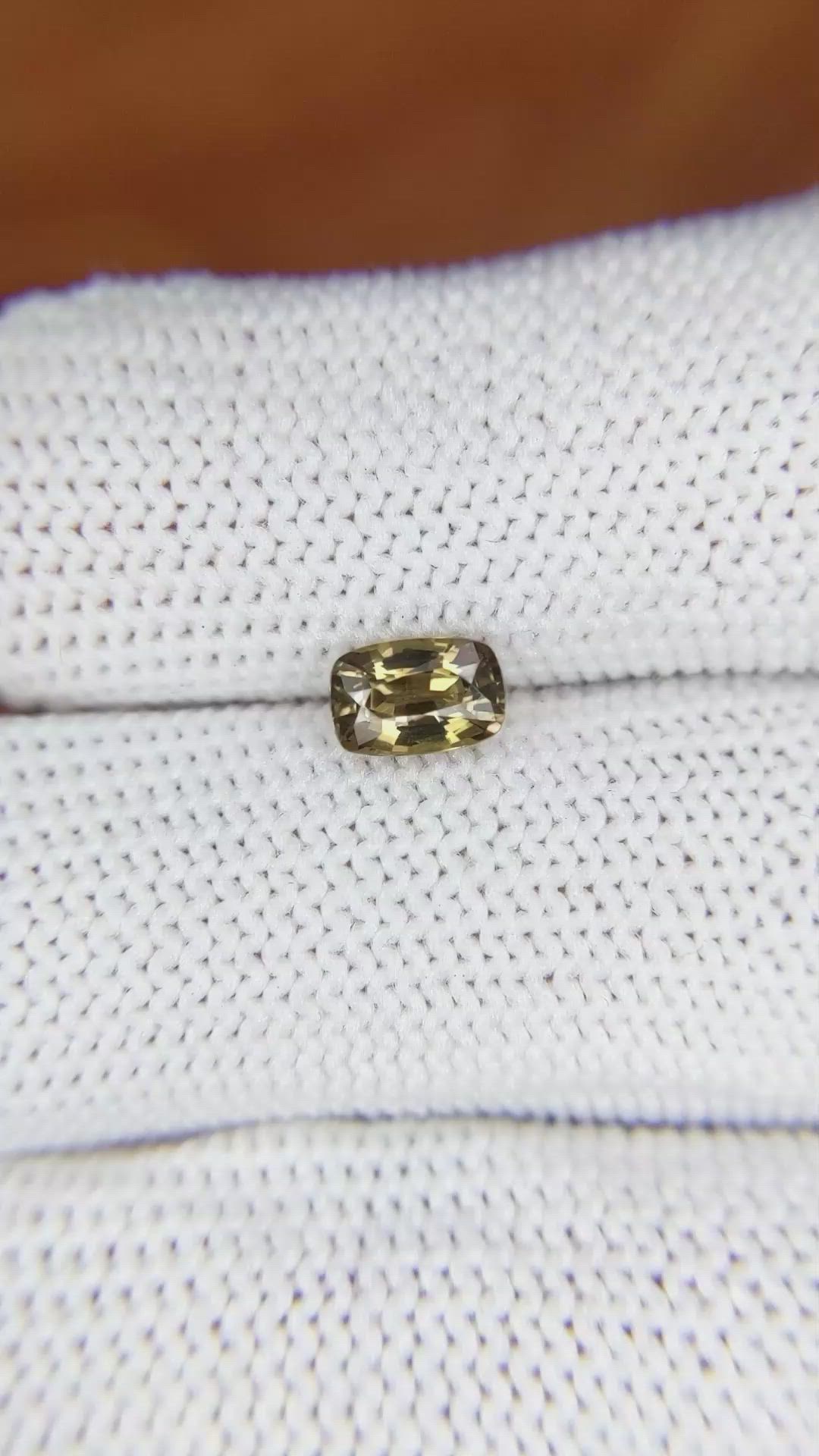 0.87 Ct. Yellowish Brown Sapphire from Madagascar Size Video
