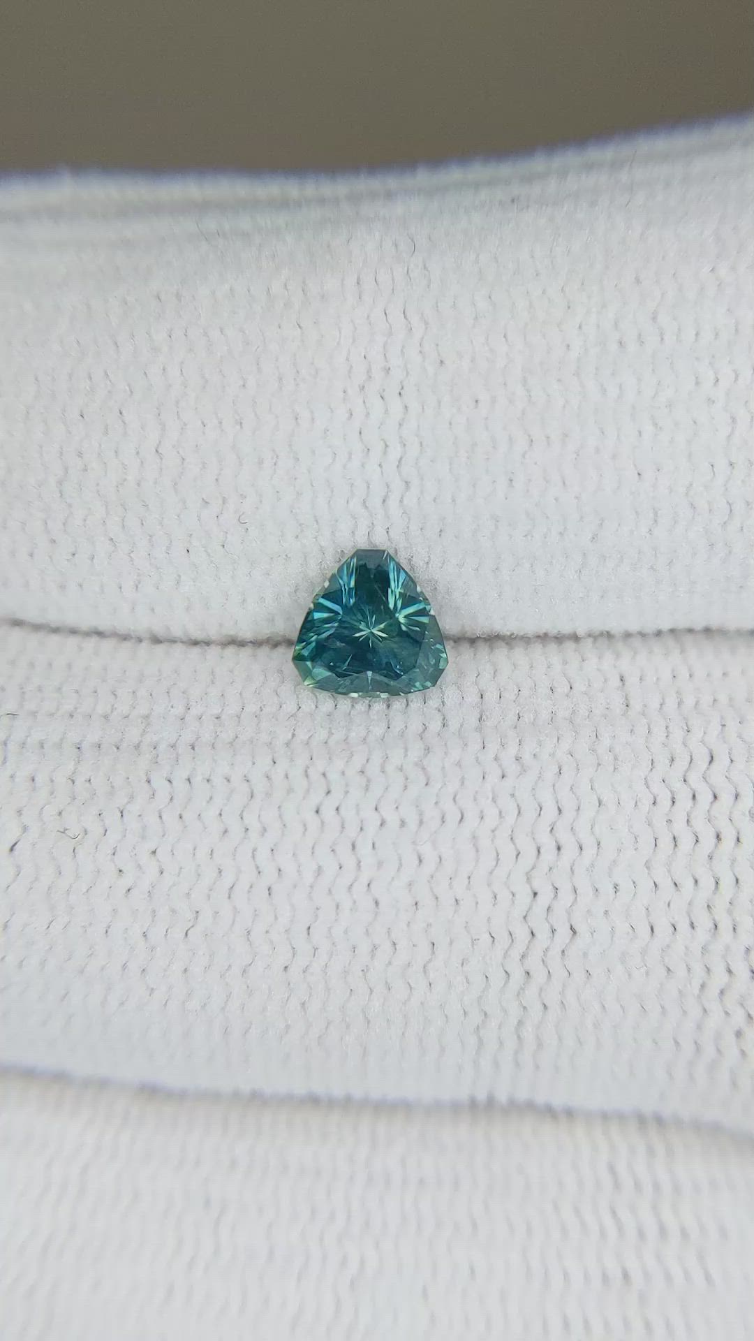 0.75 Ct. Bluish Green Sapphire from Montana Size Video