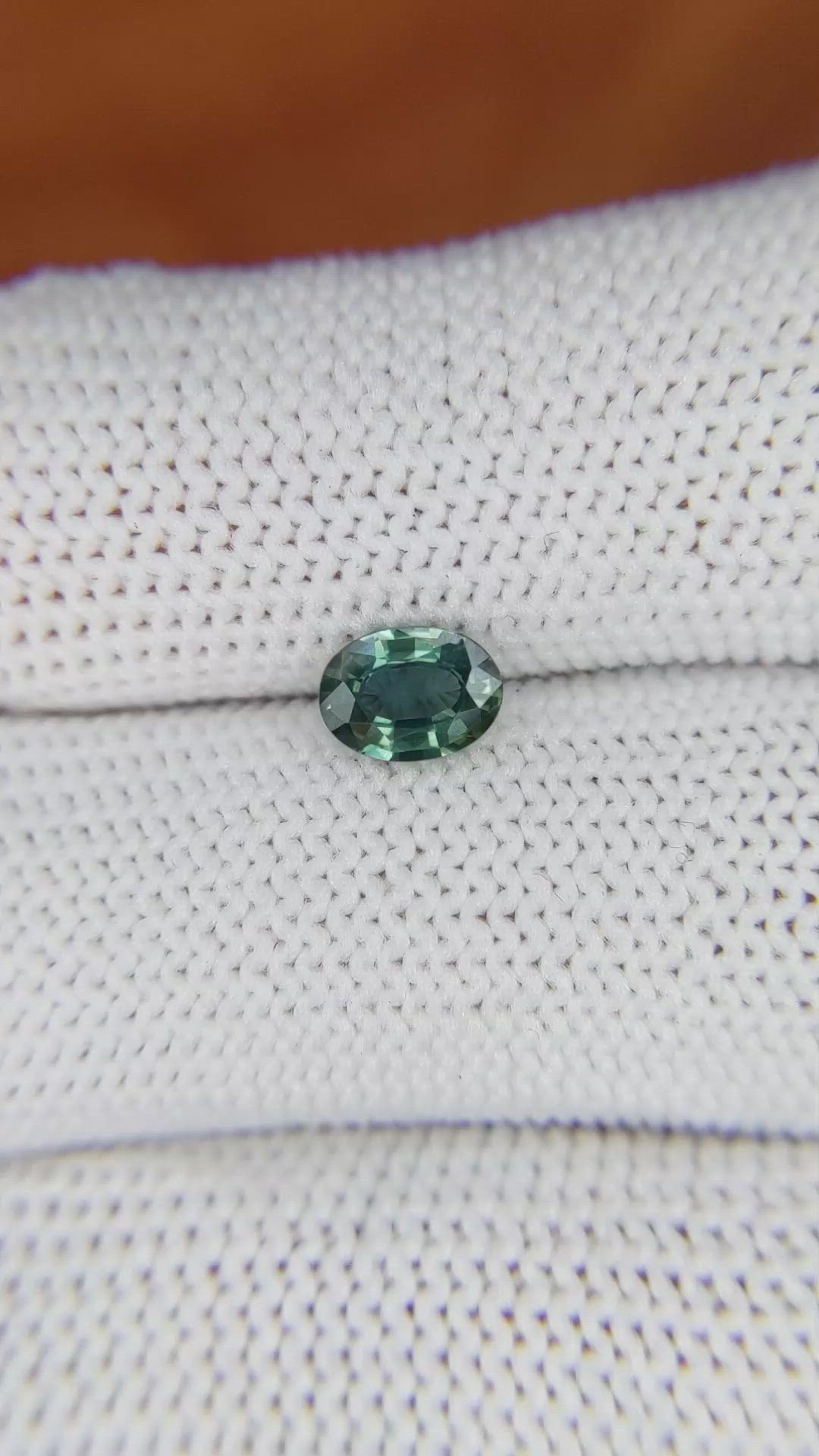 0.71 Ct. Bluish Green Sapphire from Madagascar Size Video