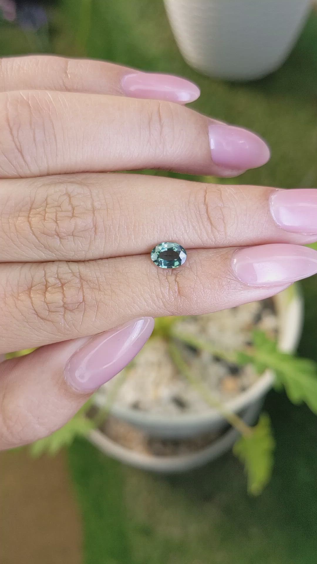 0.71 Ct. Bluish Green Sapphire from Madagascar Size Video