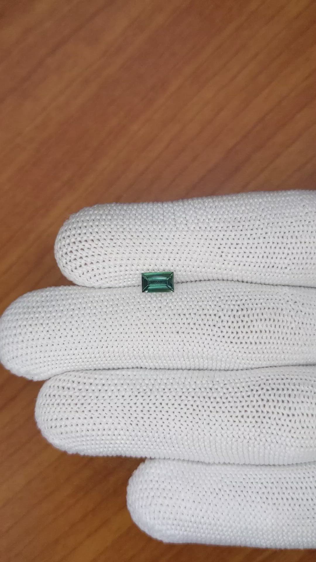 0.66 Ct. Bluish Green Sapphire from Madagascar Size Video