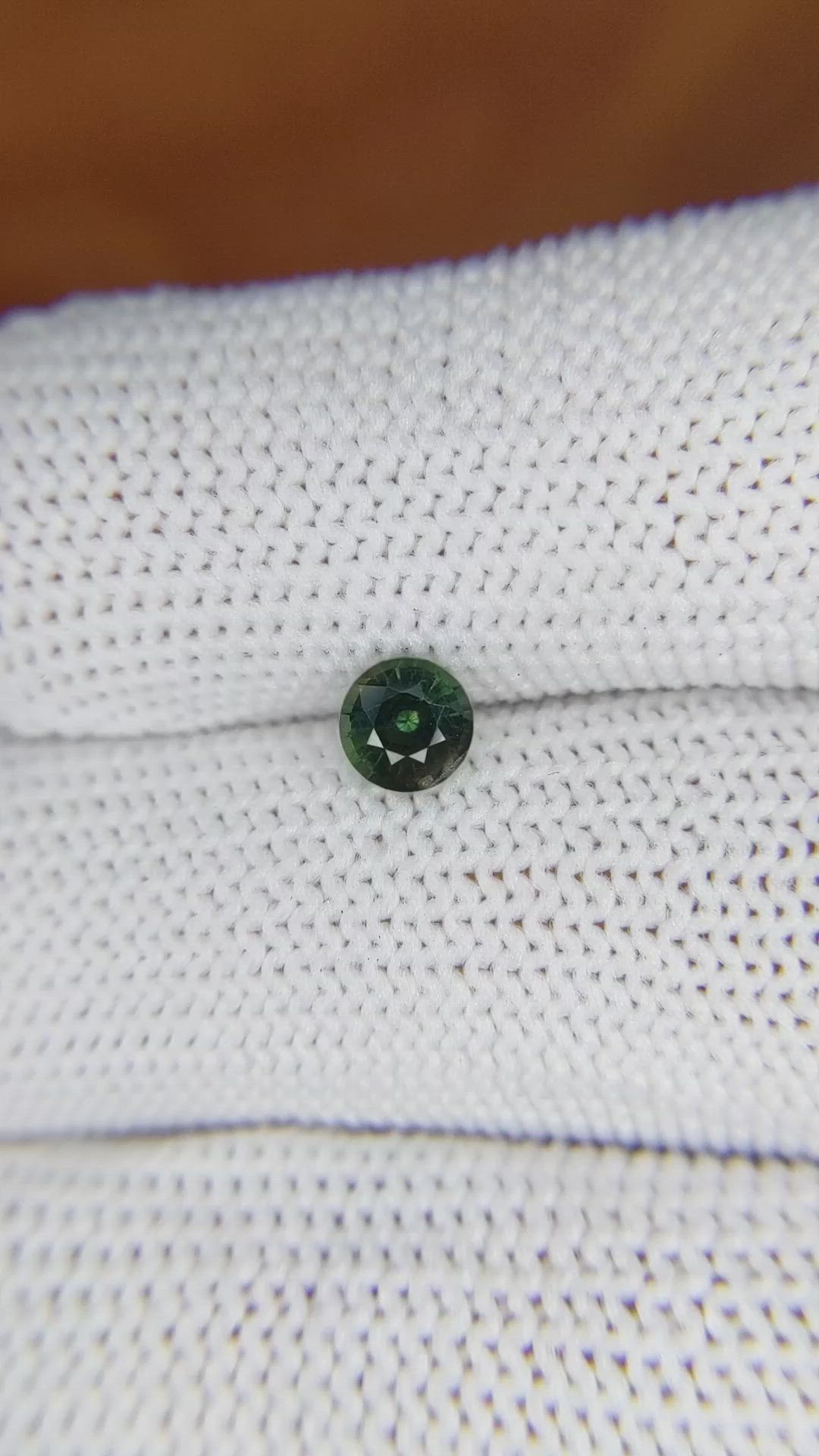 0.59 Ct. Bluish Green Sapphire from Madagascar Size Video