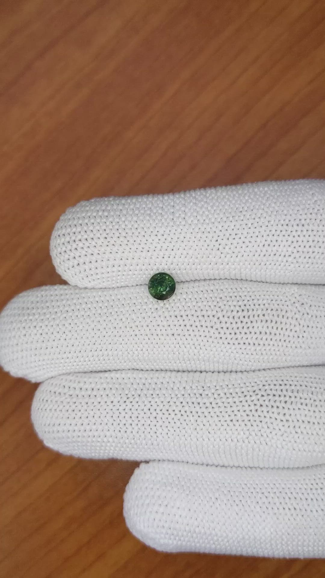 0.59 Ct. Bluish Green Sapphire from Madagascar Size Video