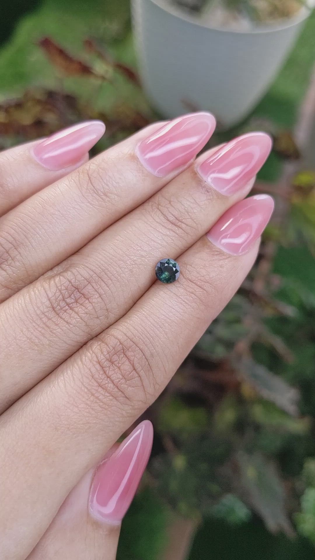0.59 Ct. Bluish Green Sapphire from Madagascar Size Video