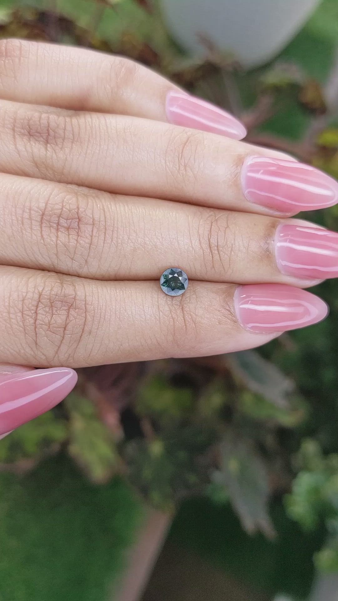 0.59 Ct. Bluish Green Sapphire from Madagascar Size Video