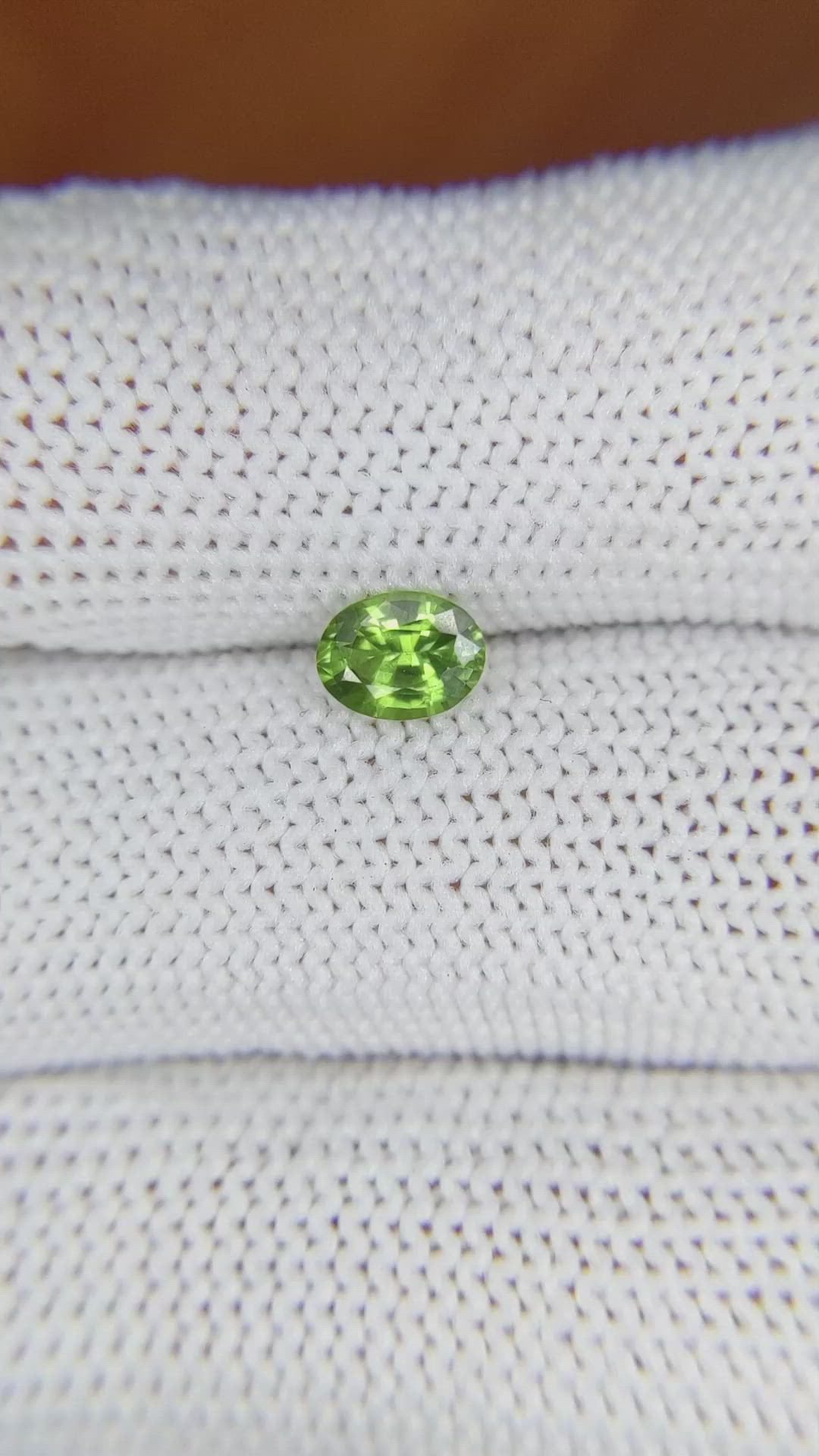 0.66 Ct. Yellowish Green Sapphire from Madagascar Size Video