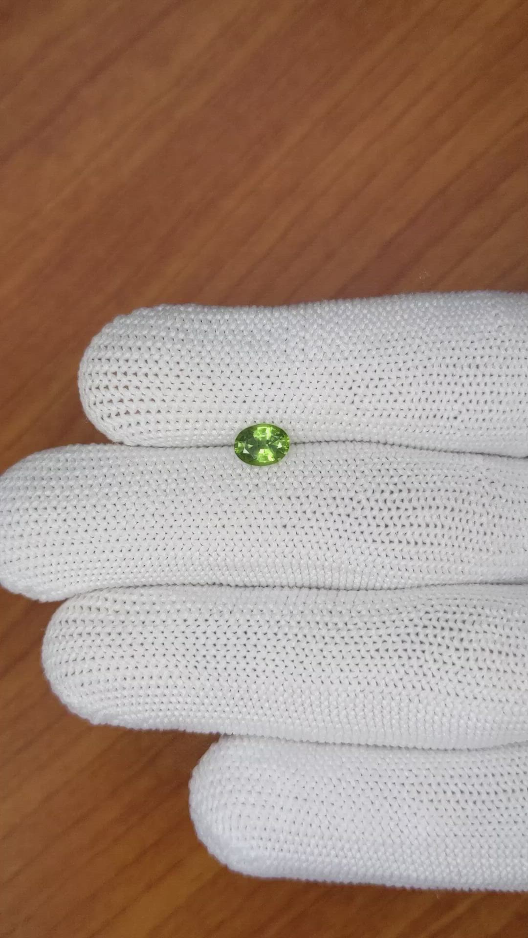0.66 Ct. Yellowish Green Sapphire from Madagascar Size Video