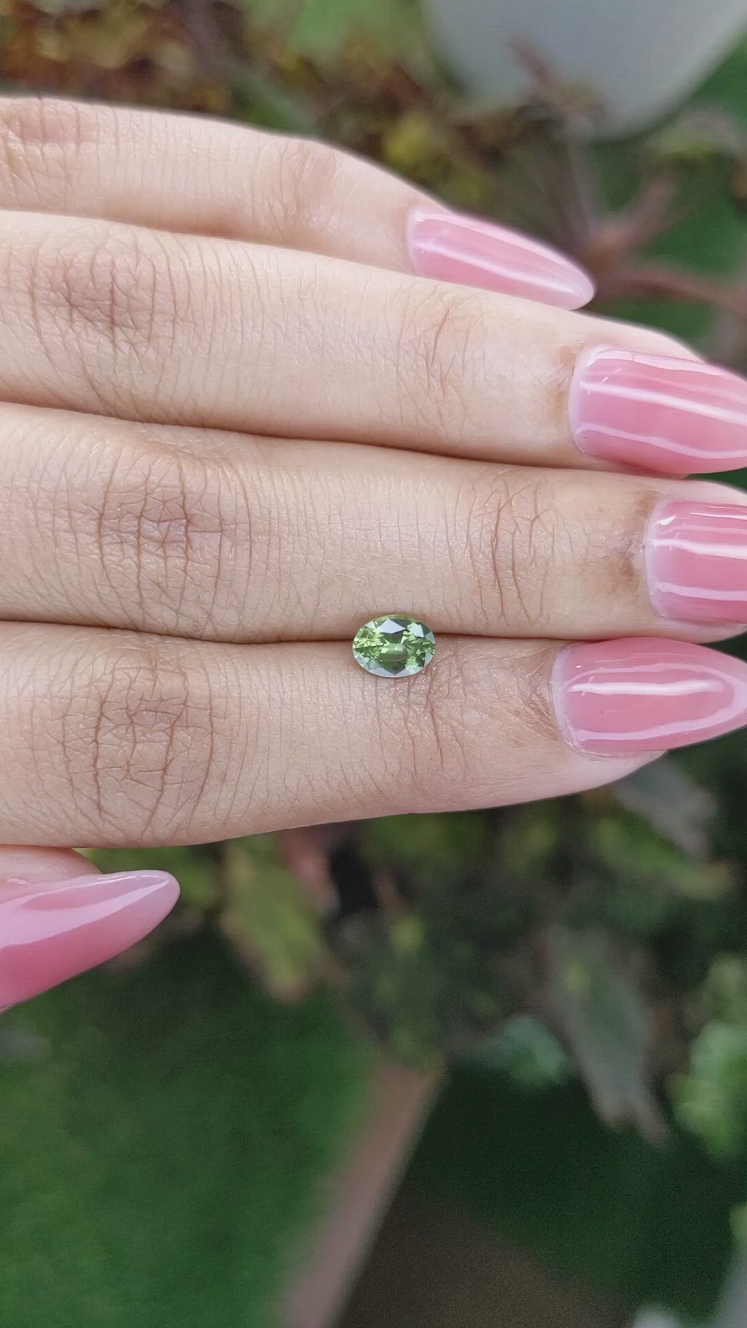0.66 Ct. Yellowish Green Sapphire from Madagascar Size Video
