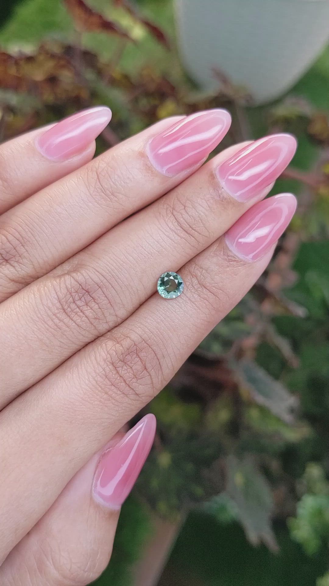 0.60 Ct. Bluish Green Sapphire from Madagascar Size Video