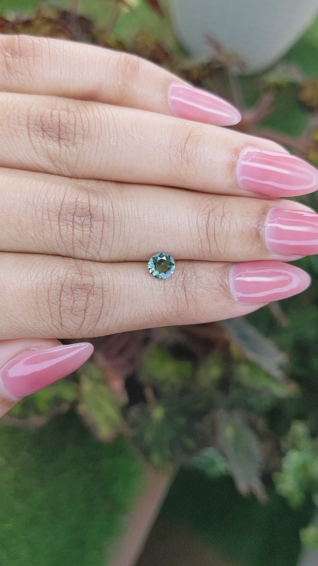 0.60 Ct. Bluish Green Sapphire from Madagascar Size Video