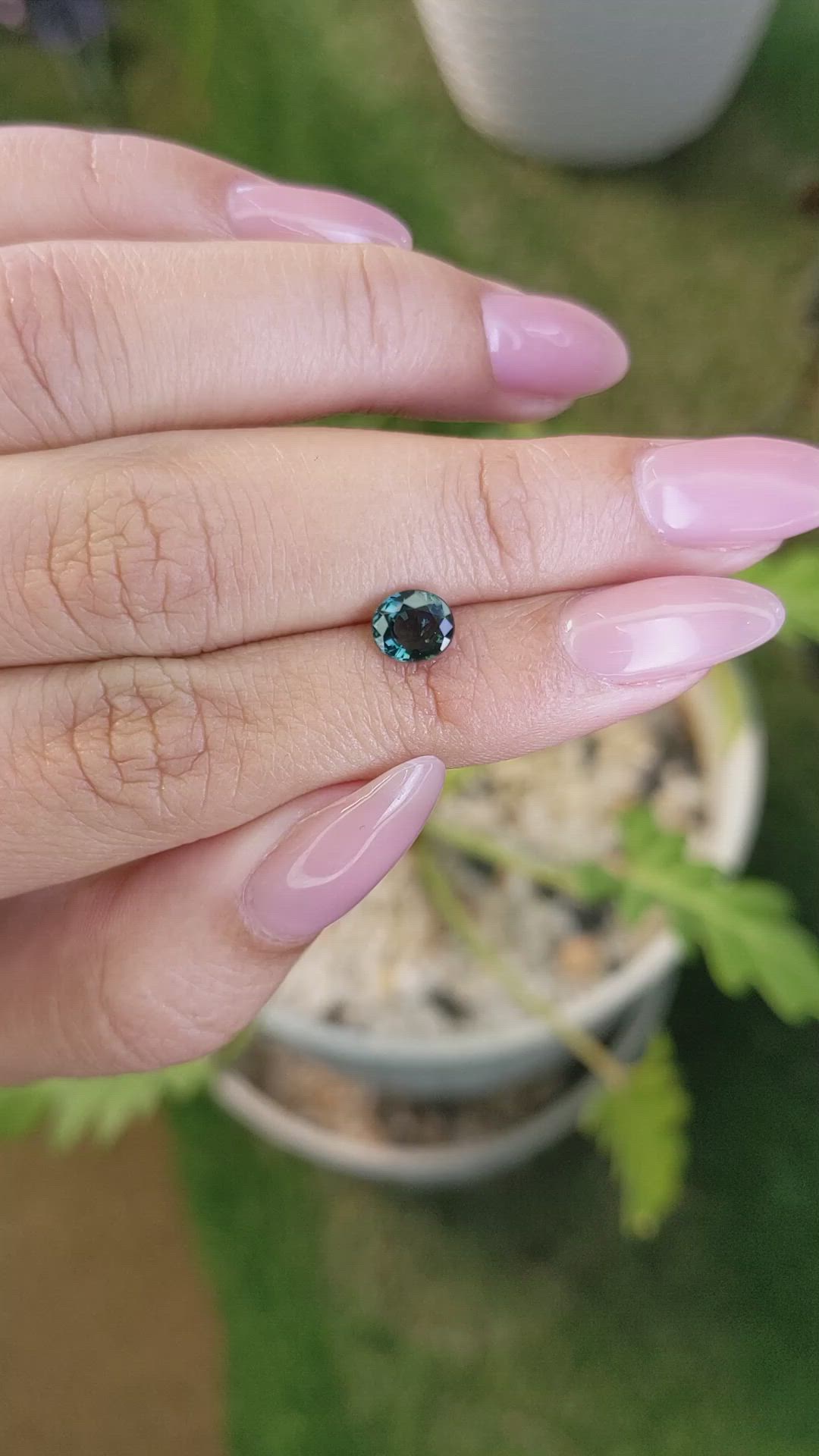 0.97 Ct. Bluish Green Sapphire from Madagascar Size Video