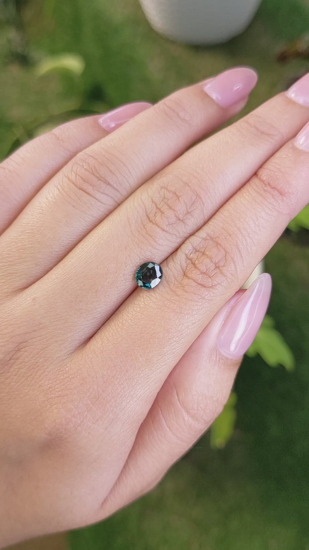 0.97 Ct. Bluish Green Sapphire from Madagascar Size Video