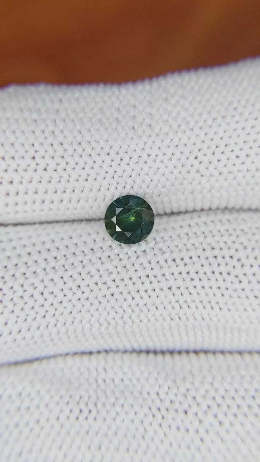 0.79 Ct. Bluish Green Sapphire from Madagascar Size Video