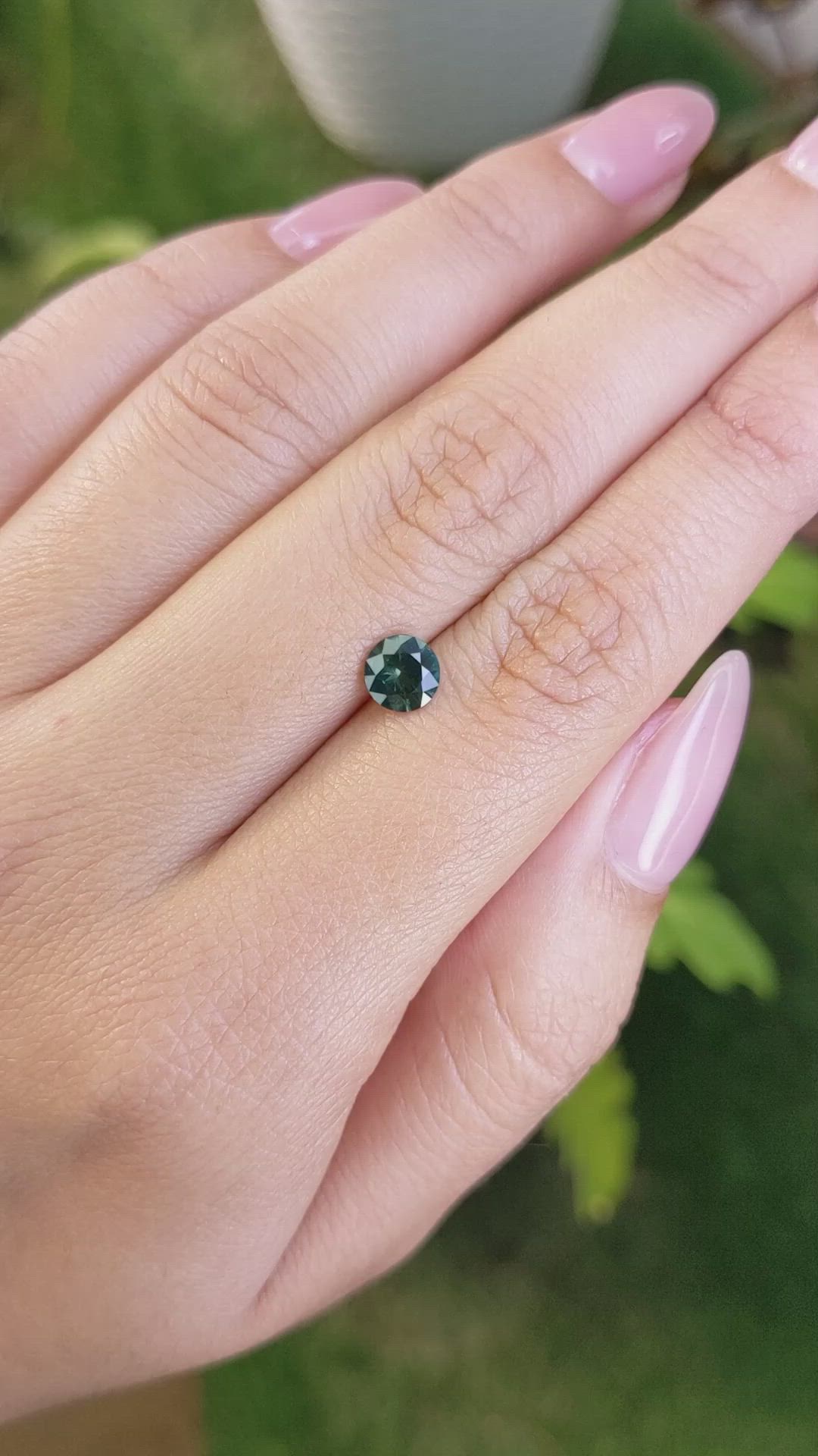 0.79 Ct. Bluish Green Sapphire from Madagascar Size Video