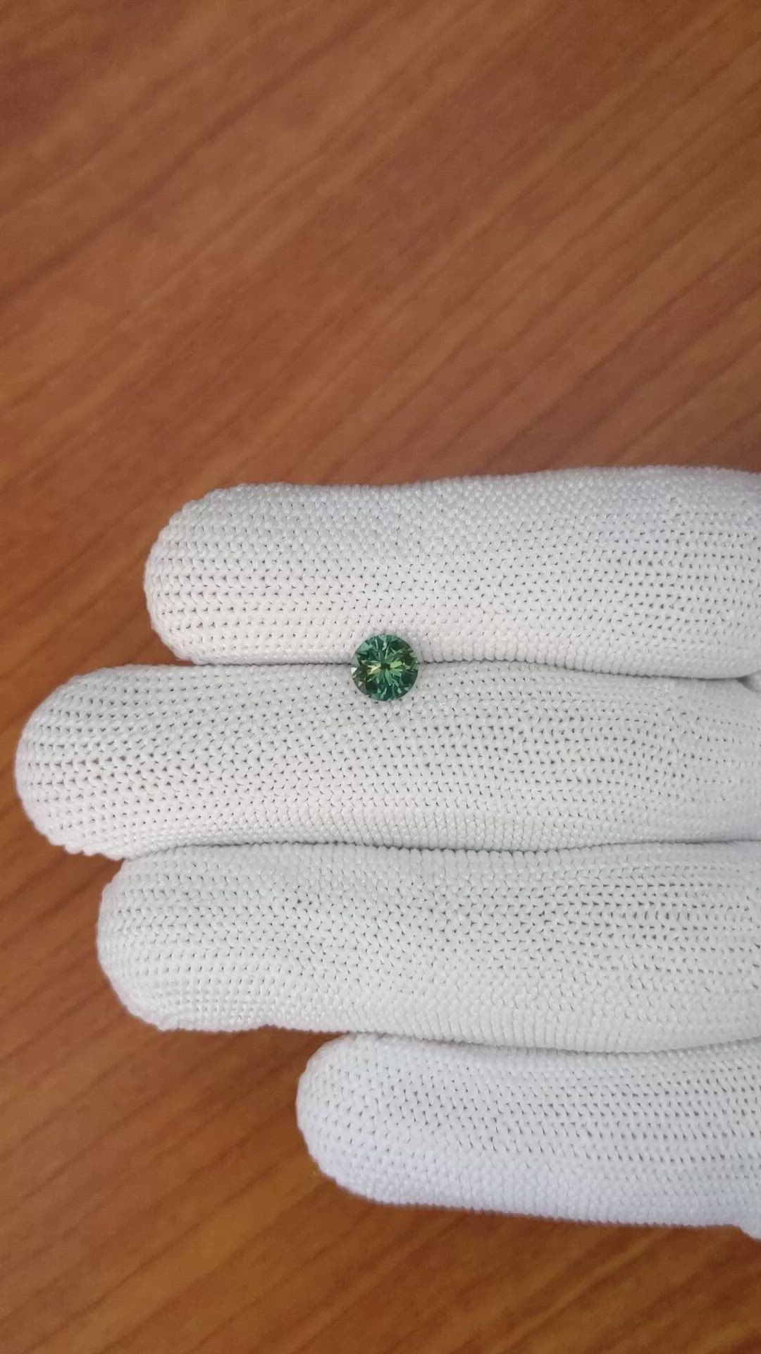 0.79 Ct. Bluish Green Sapphire from Madagascar Size Video