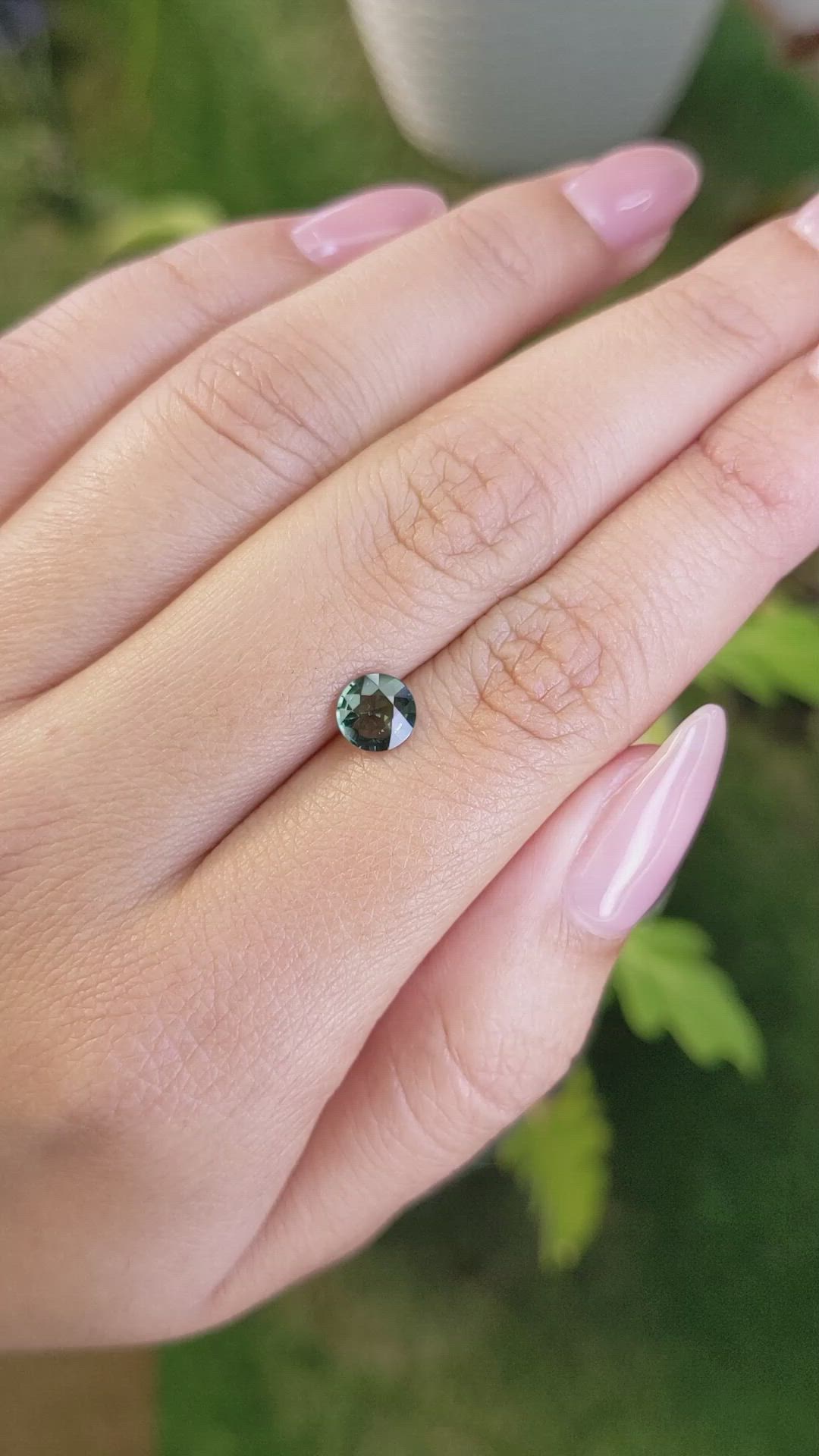 0.86 Ct. Bluish Green Sapphire from Madagascar Size Video