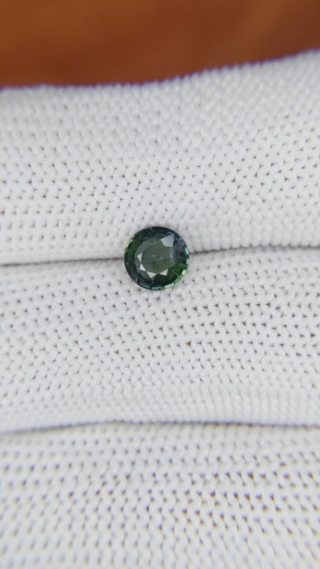 0.86 Ct. Bluish Green Sapphire from Madagascar Size Video