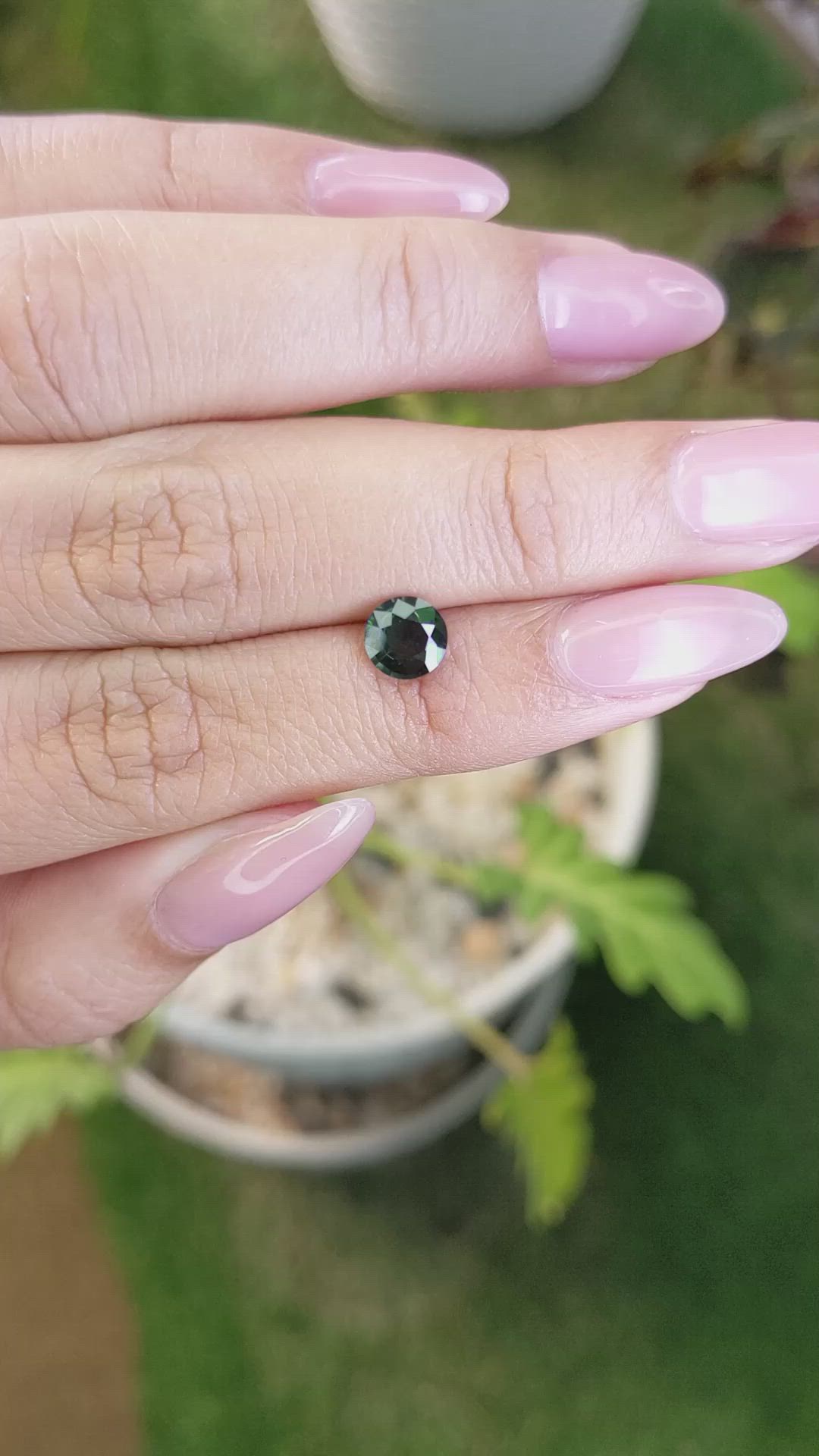 0.91 Ct. Bluish Green Sapphire from Madagascar Size Video