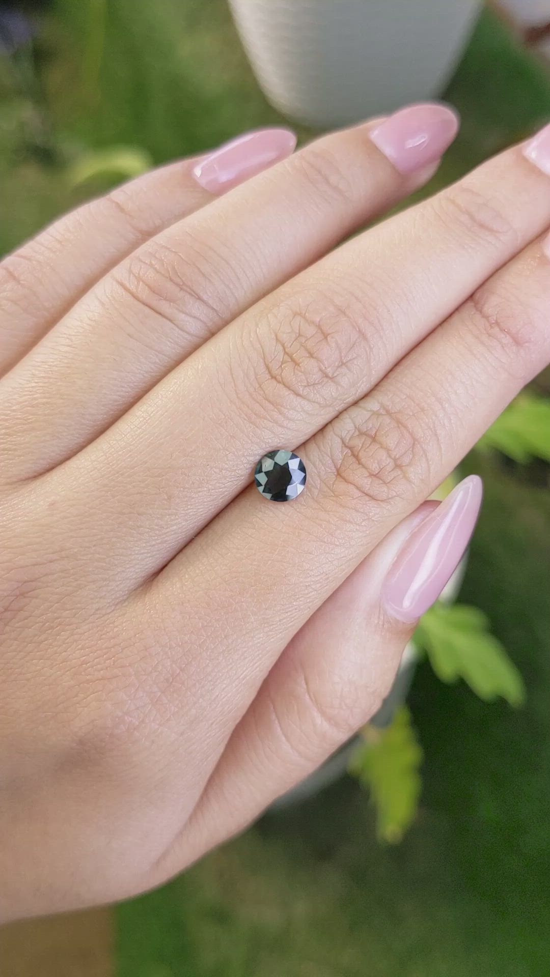 0.91 Ct. Bluish Green Sapphire from Madagascar Size Video