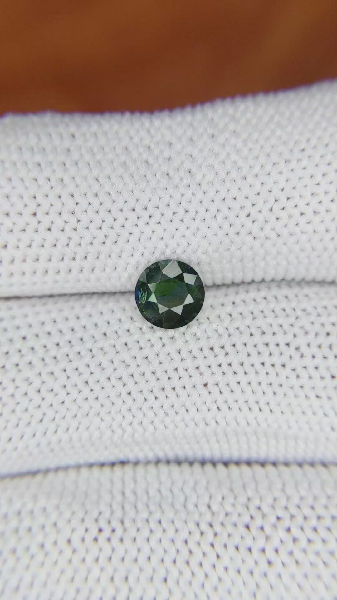 0.91 Ct. Bluish Green Sapphire from Madagascar Size Video