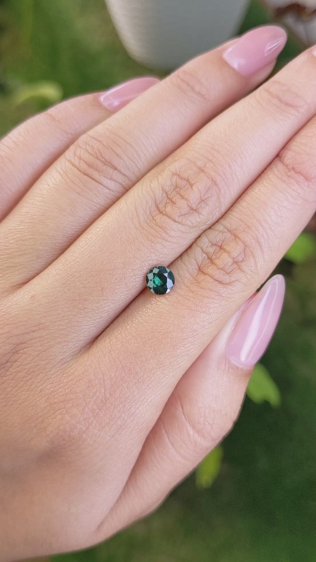 0.68 Ct. Bluish Green Sapphire from Madagascar Size Video