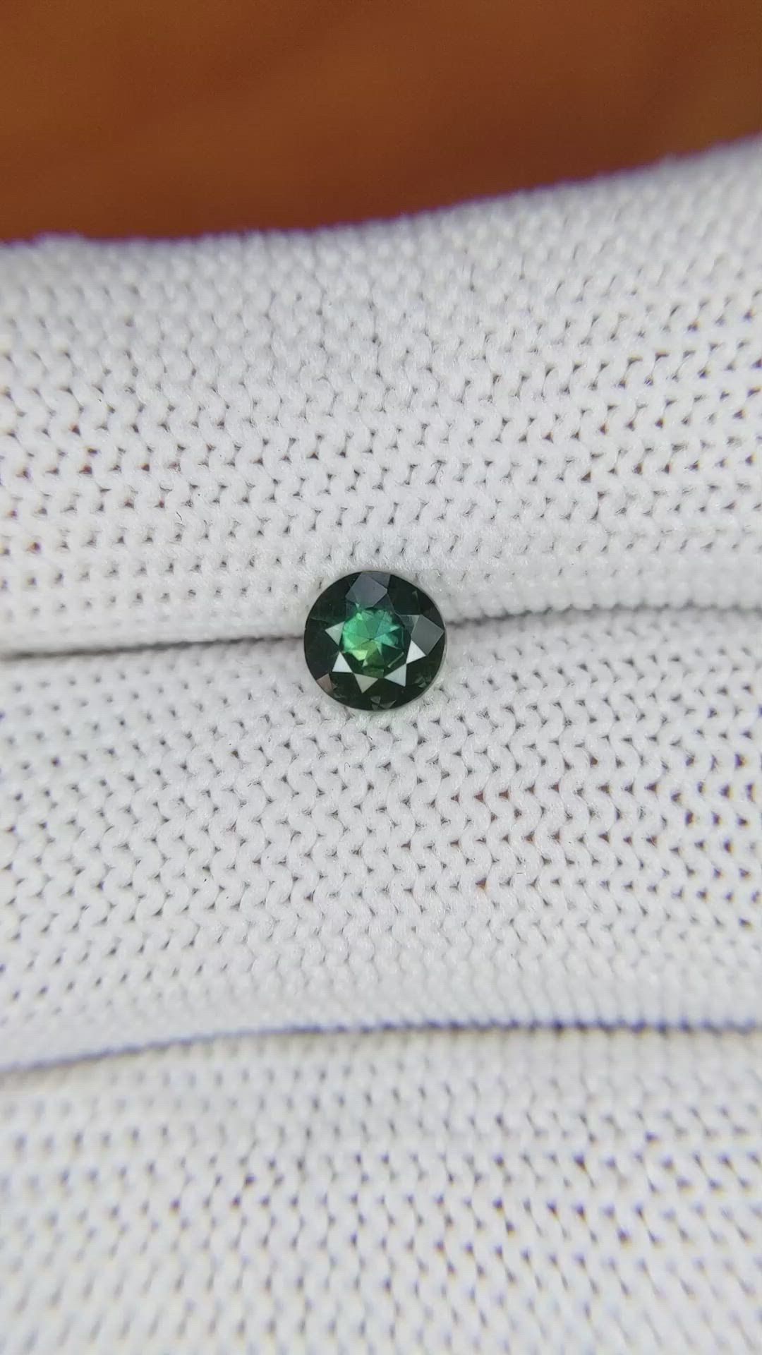 0.68 Ct. Bluish Green Sapphire from Madagascar Size Video
