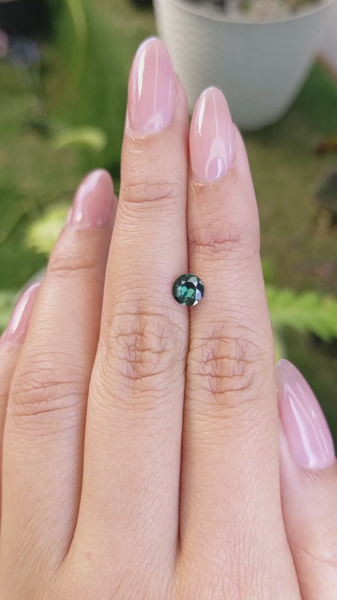 0.68 Ct. Bluish Green Sapphire from Madagascar Size Video