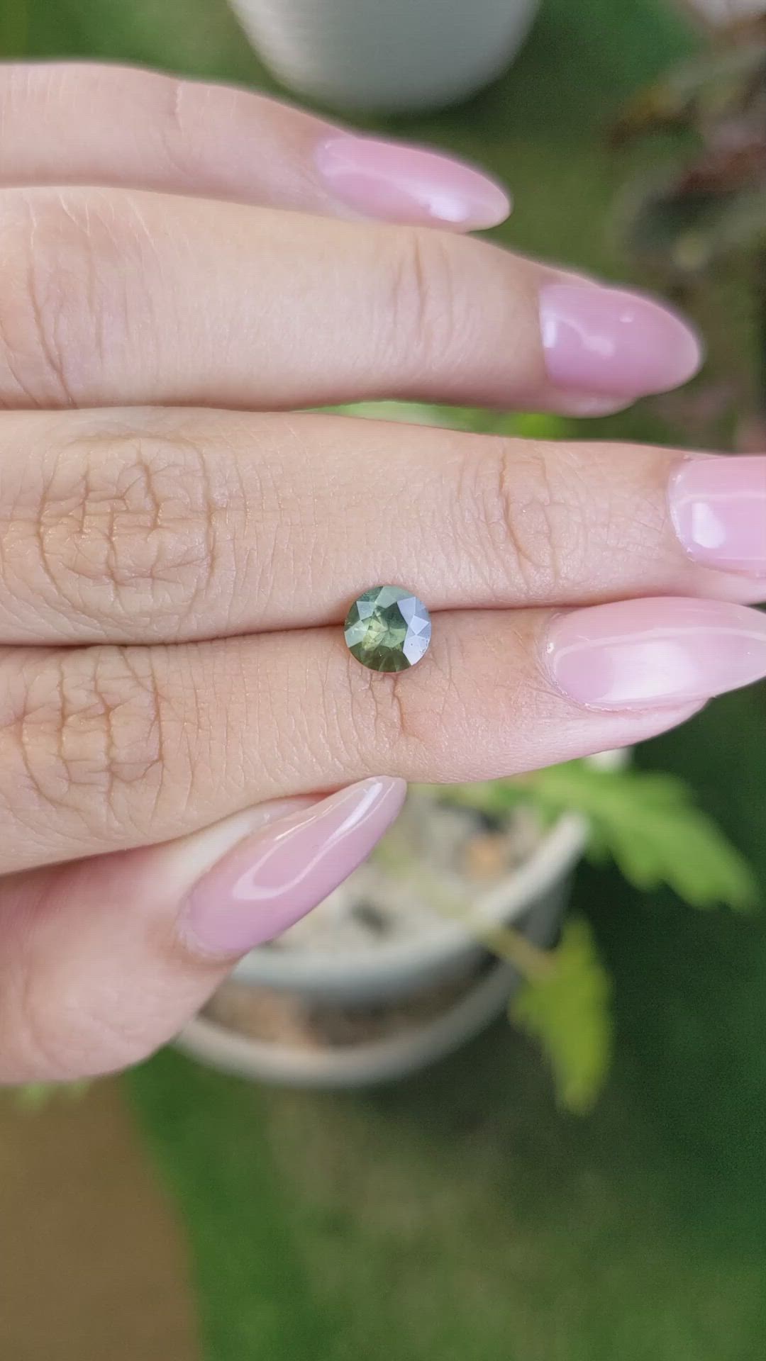 0.72 Ct. Yellowish Green Sapphire from Madagascar Size Video