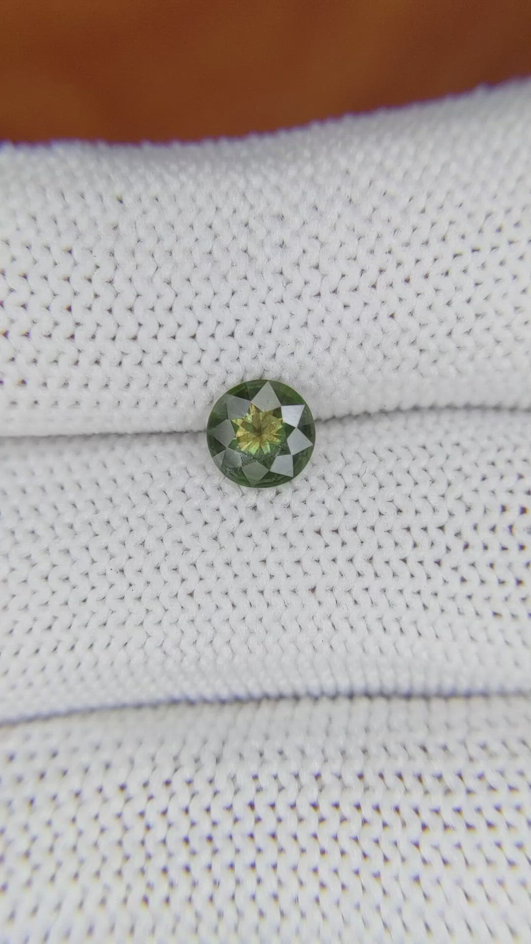 0.72 Ct. Yellowish Green Sapphire from Madagascar Size Video