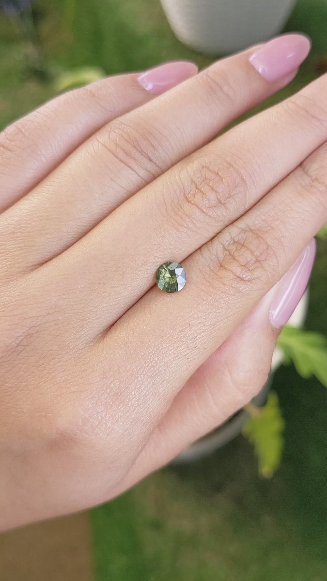 0.72 Ct. Yellowish Green Sapphire from Madagascar Size Video