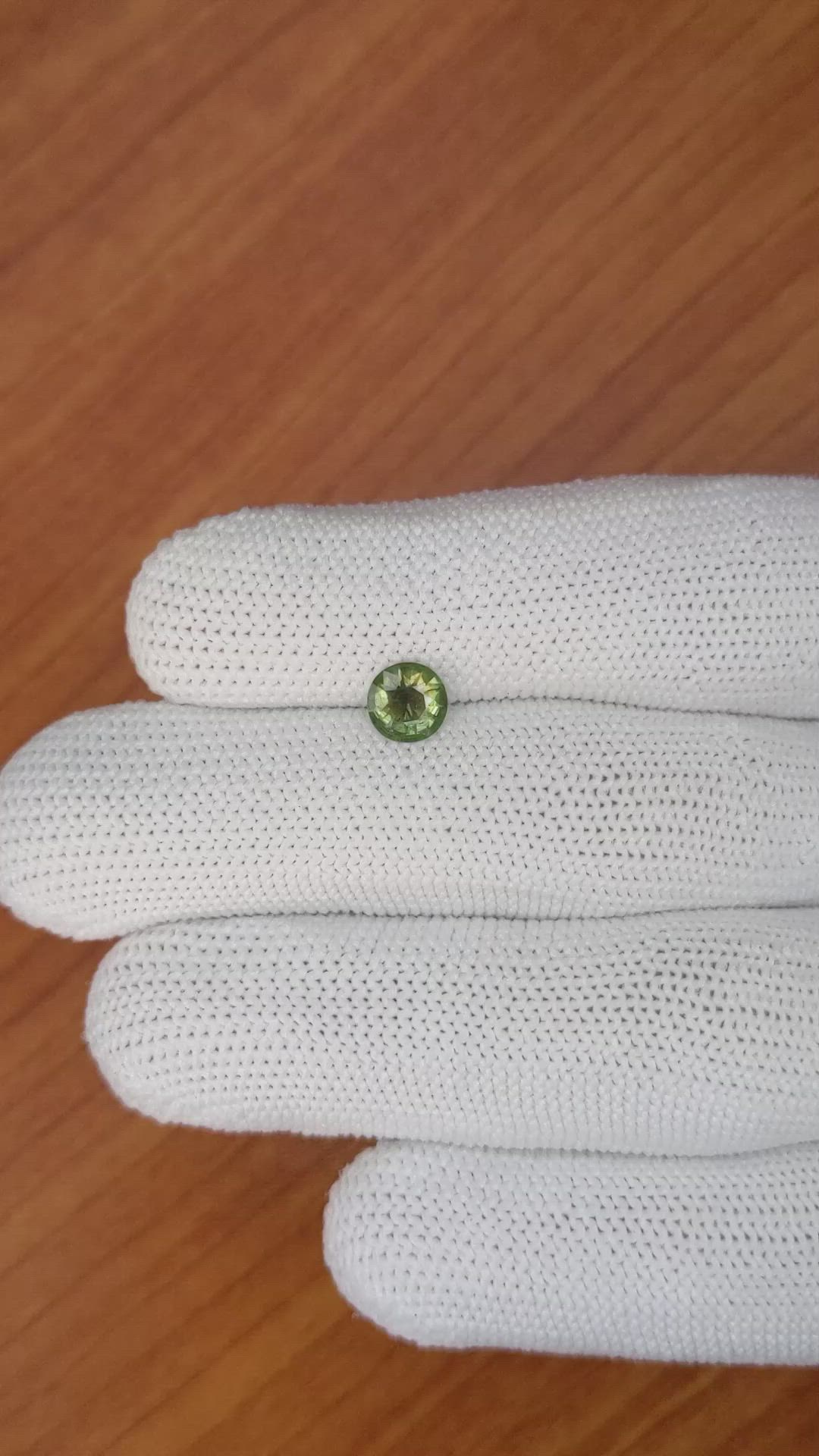 0.72 Ct. Yellowish Green Sapphire from Madagascar Size Video