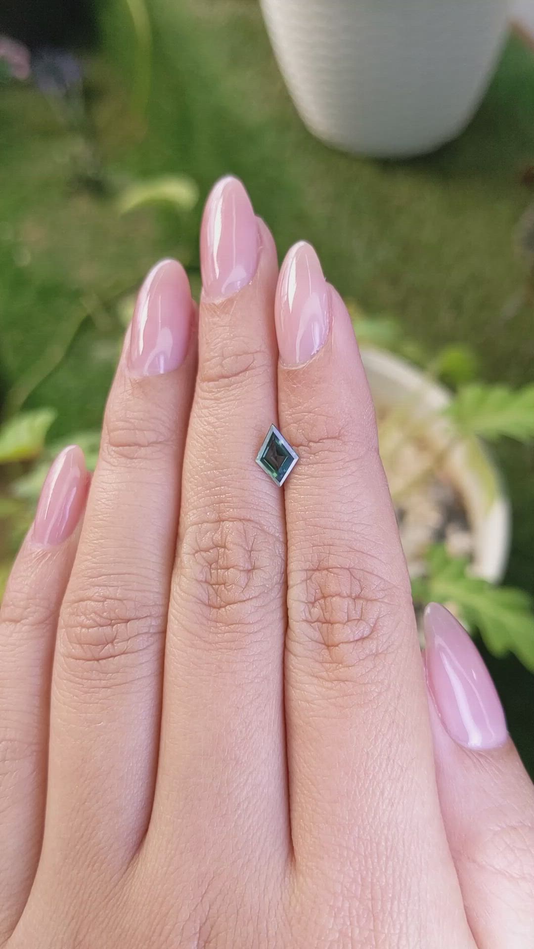 0.69 Ct. Bluish Green Sapphire from Madagascar Size Video