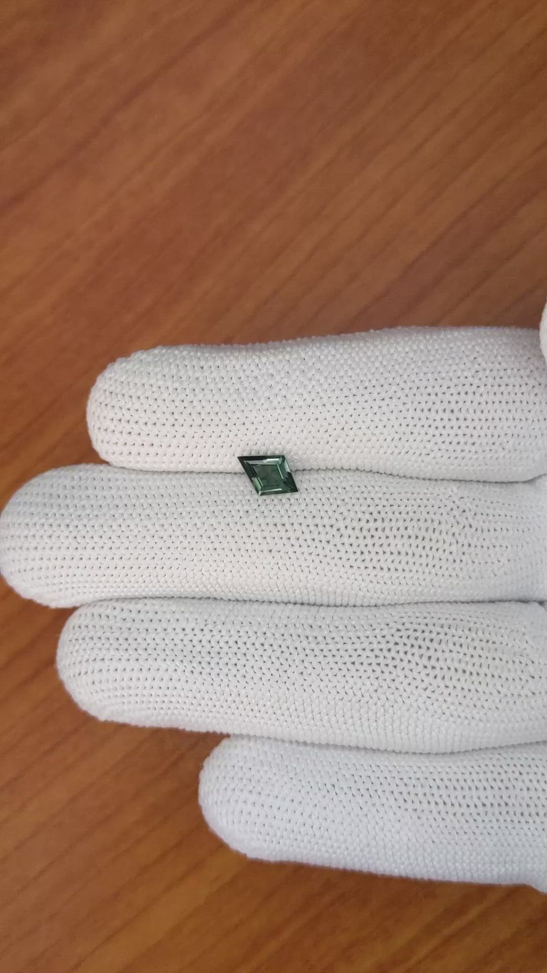 0.69 Ct. Bluish Green Sapphire from Madagascar Size Video