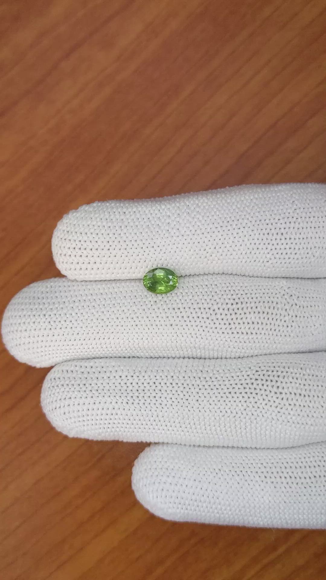0.98 Ct. Yellowish Green Sapphire from Madagascar Size Video
