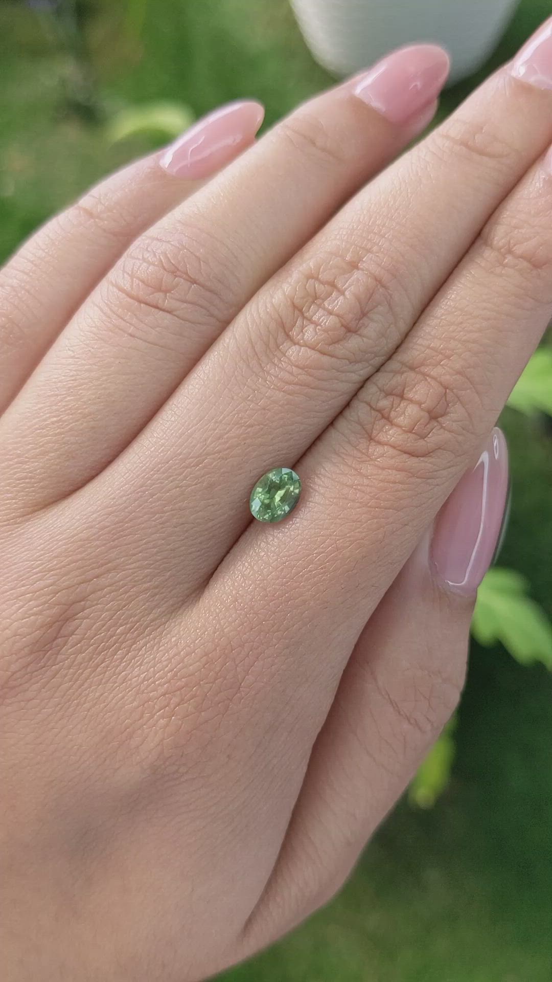 0.98 Ct. Yellowish Green Sapphire from Madagascar Size Video