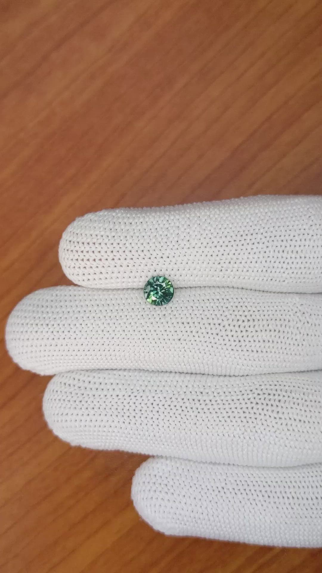 0.72 Ct. Bluish Green Sapphire from Madagascar Size Video