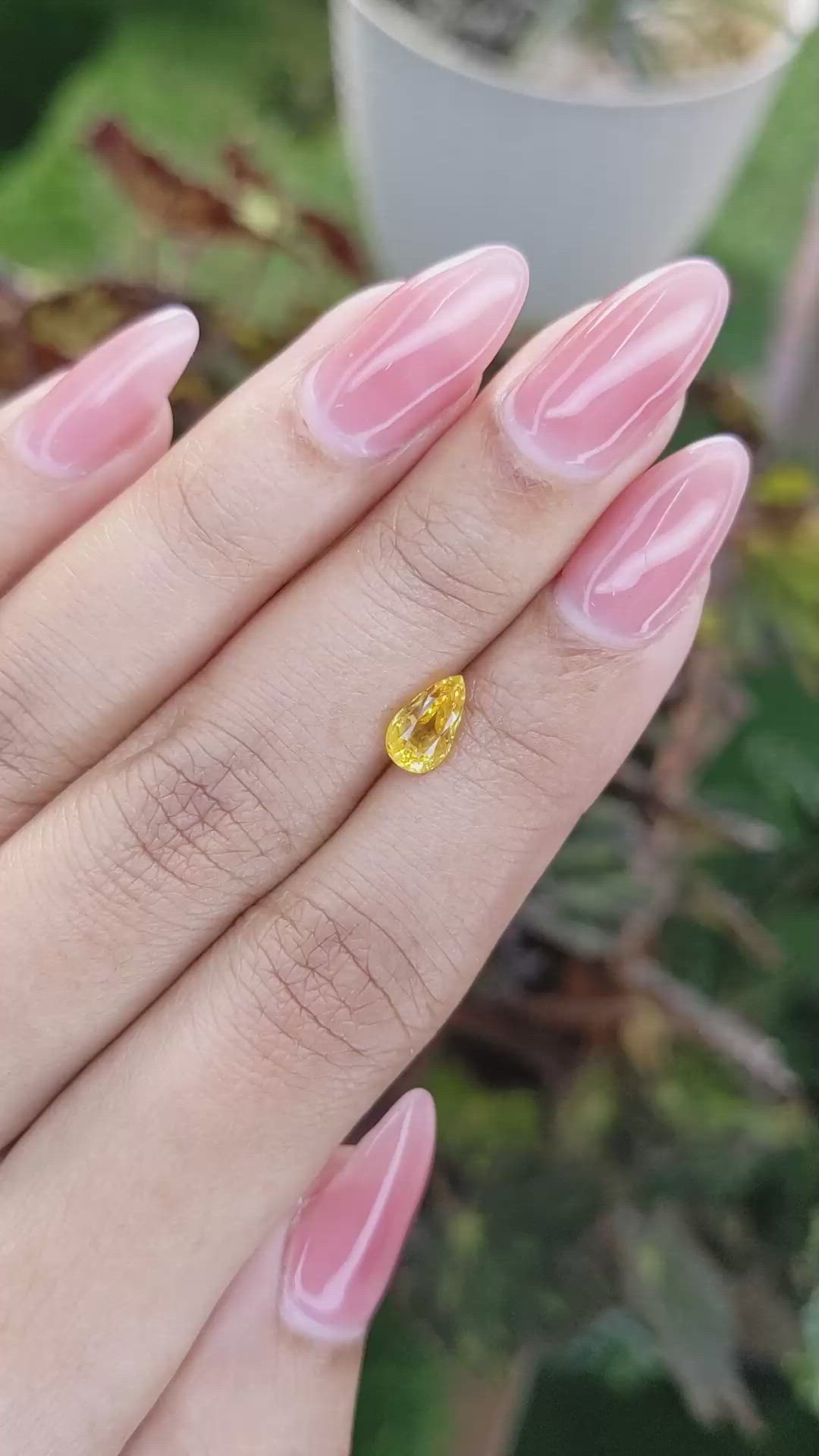 1.21 Ct. Orangish Yellow Sapphire from Ceylon (Sri Lanka) Size Video