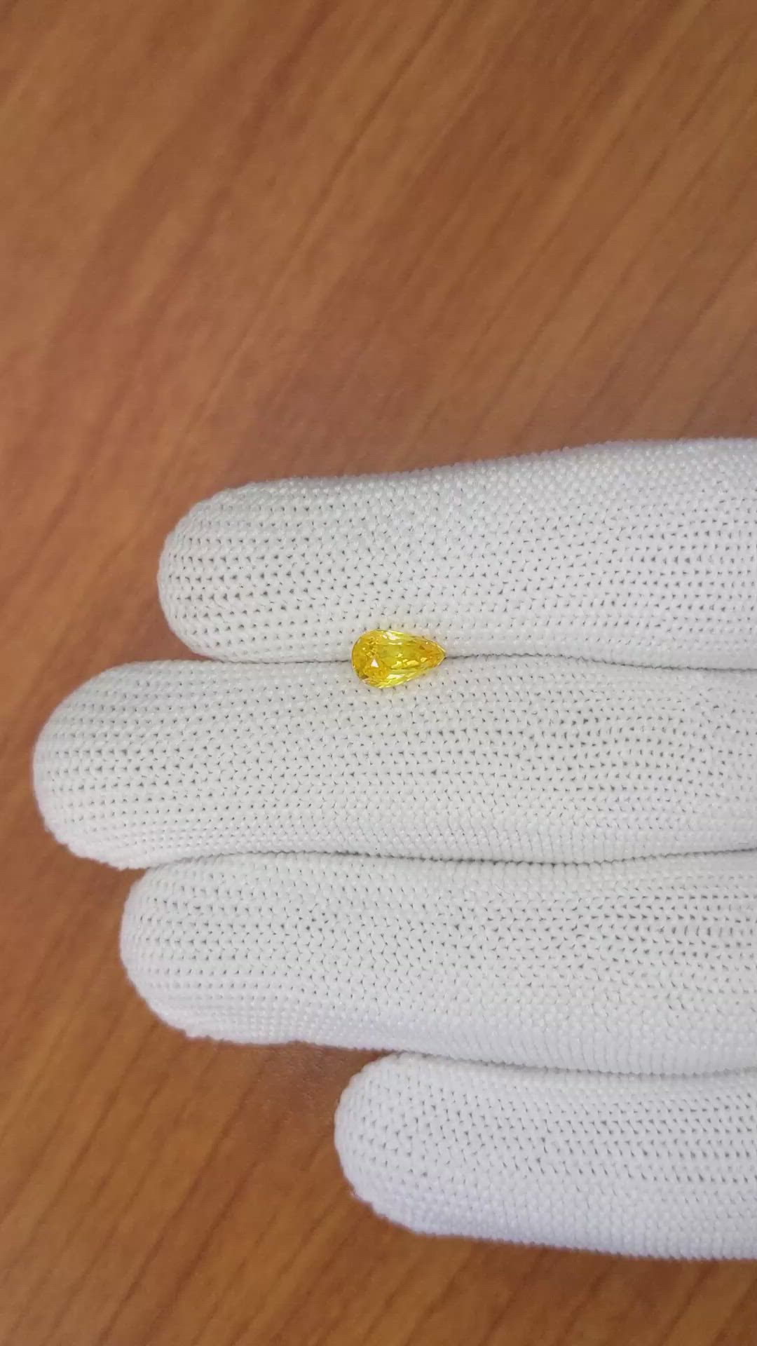 1.21 Ct. Orangish Yellow Sapphire from Ceylon (Sri Lanka) Size Video