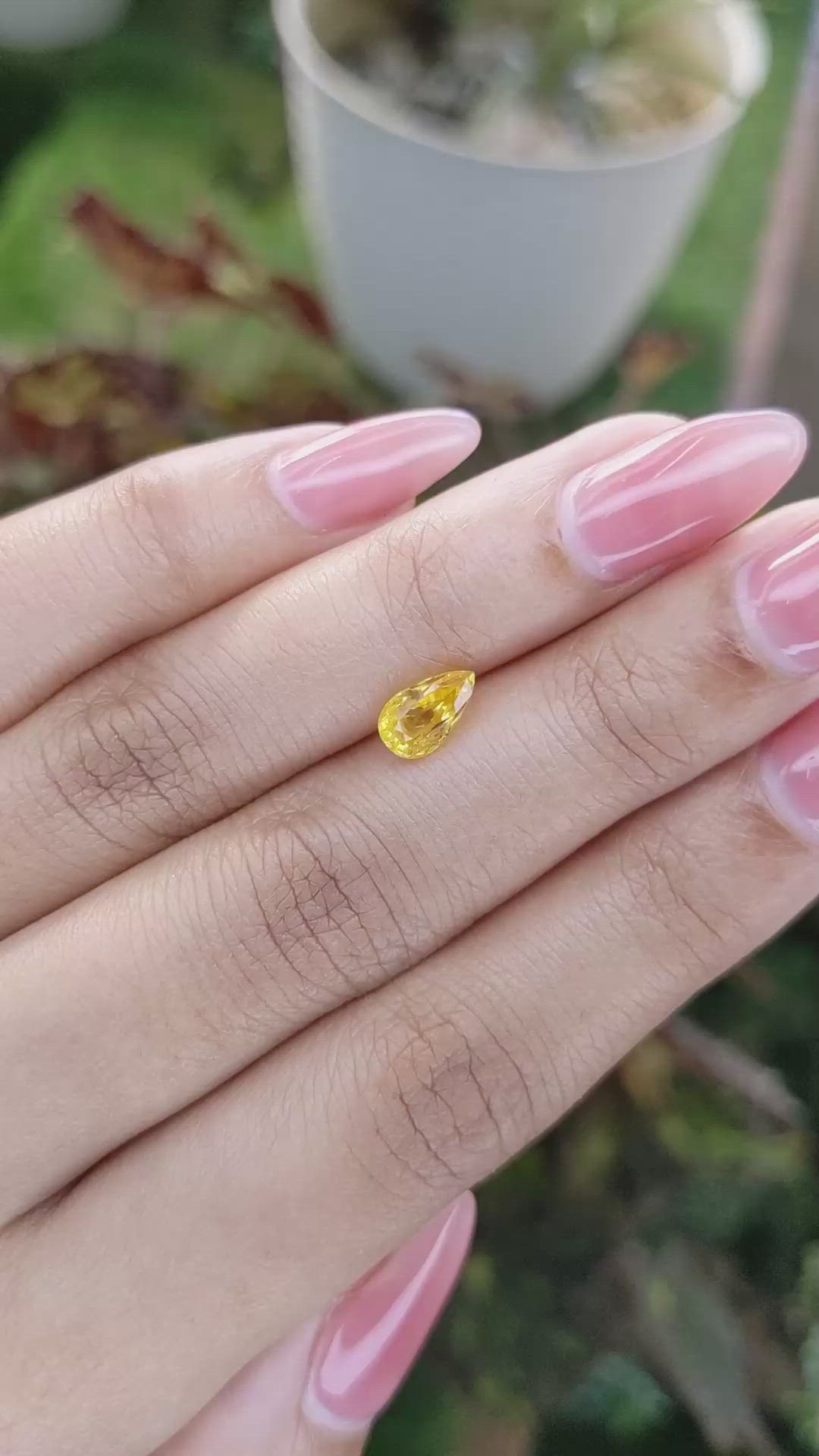 1.21 Ct. Orangish Yellow Sapphire from Ceylon (Sri Lanka) Size Video