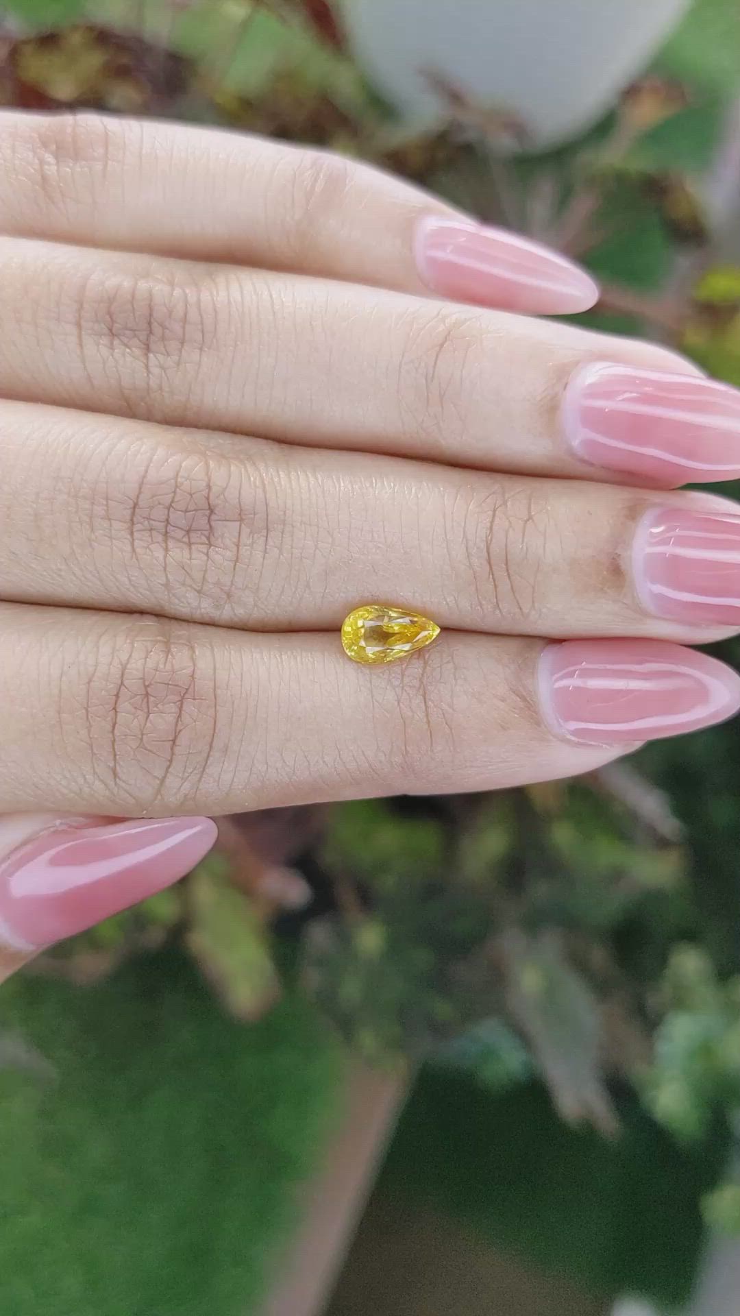 1.21 Ct. Orangish Yellow Sapphire from Ceylon (Sri Lanka) Size Video