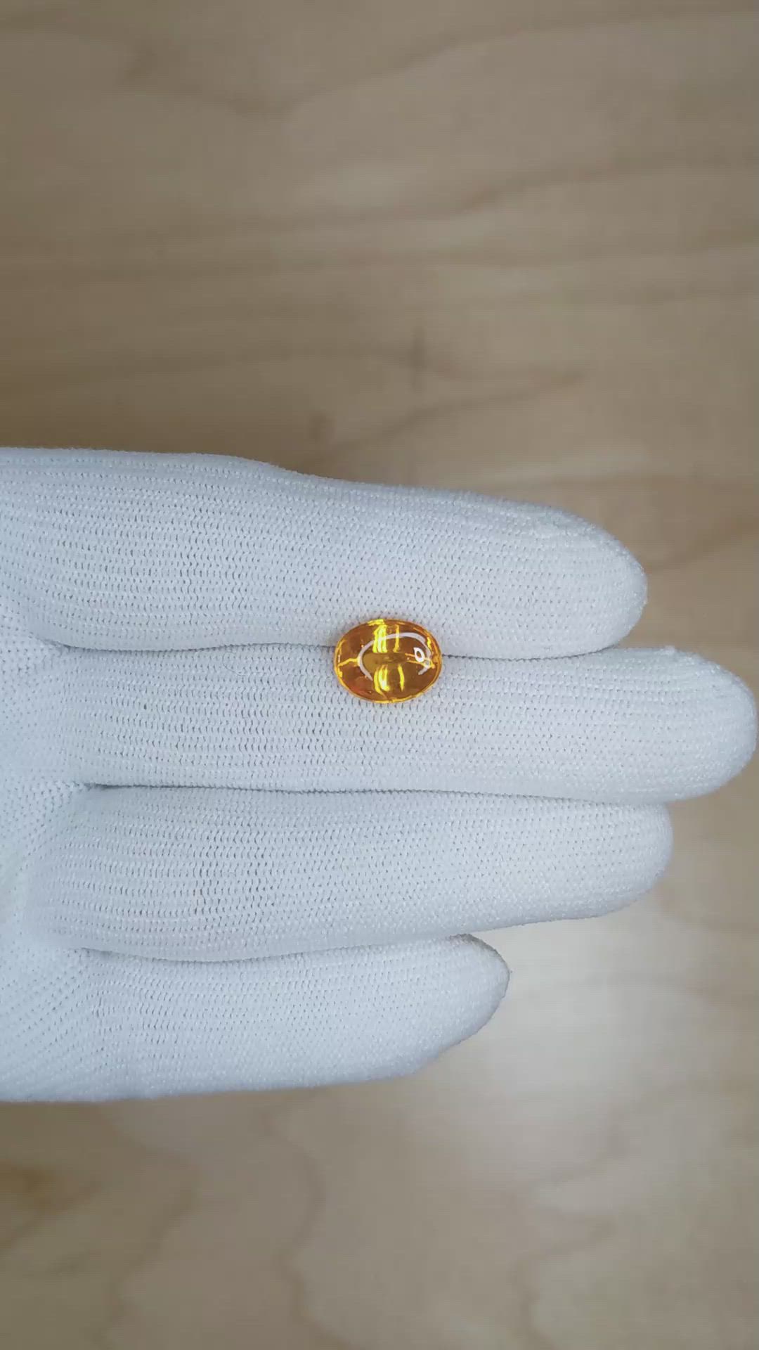 4.17 Ct. Orangish Yellow Cabochon Sapphire from Ceylon (Sri Lanka) Size Video