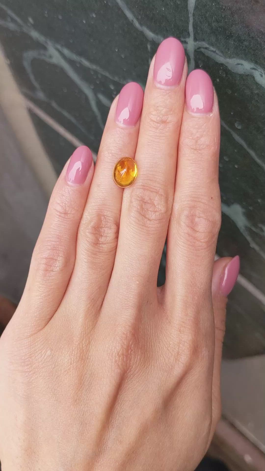 4.17 Ct. Orangish Yellow Cabochon Sapphire from Ceylon (Sri Lanka) Size Video