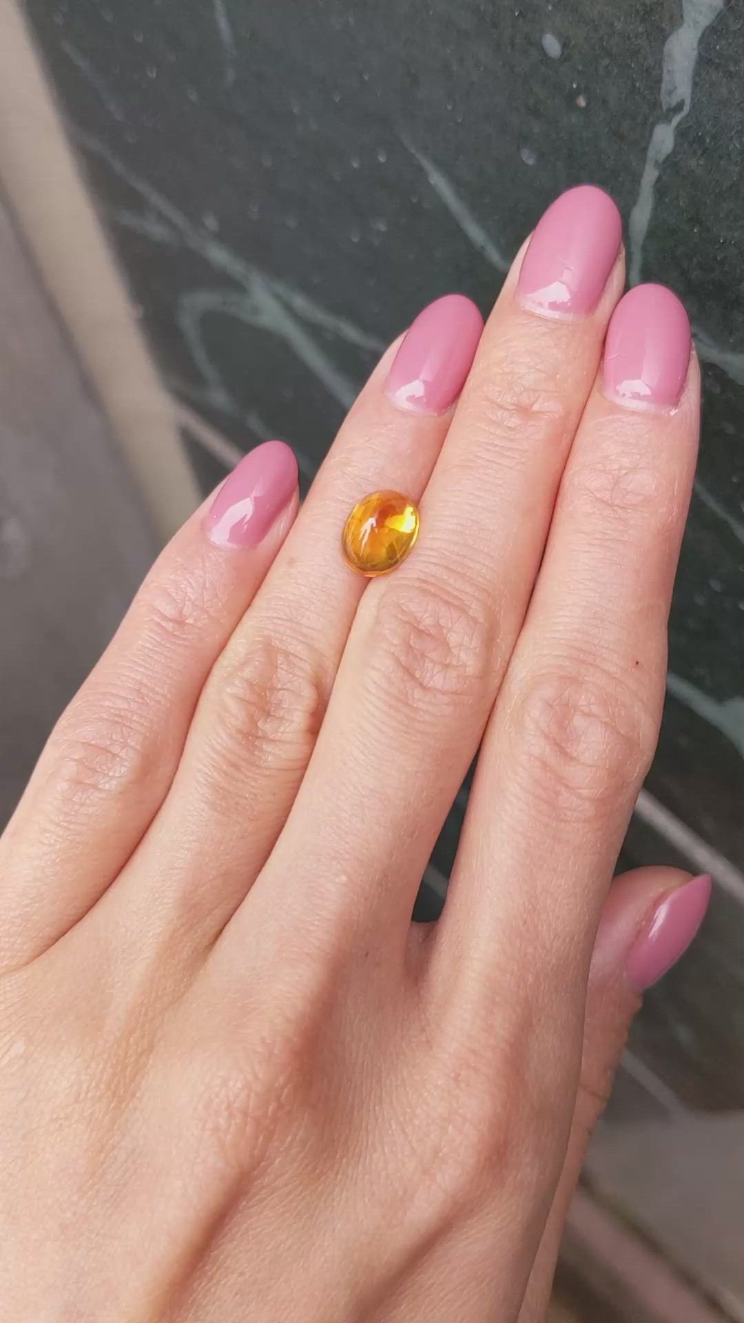 4.17 Ct. Orangish Yellow Cabochon Sapphire from Ceylon (Sri Lanka) Size Video