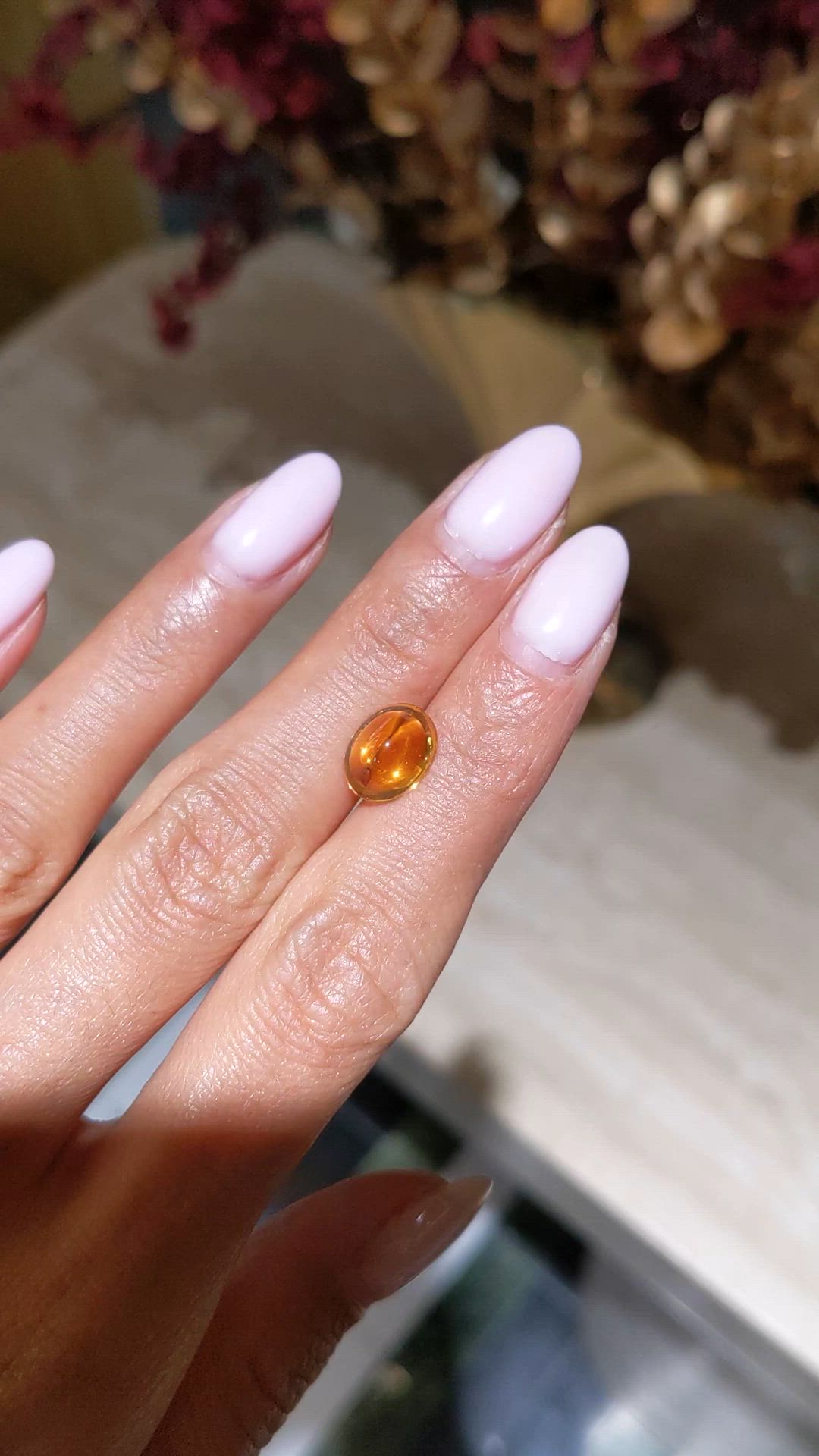 4.17 Ct. Yellowish Orange Cabochon Sapphire from Ceylon (Sri Lanka) Size Video