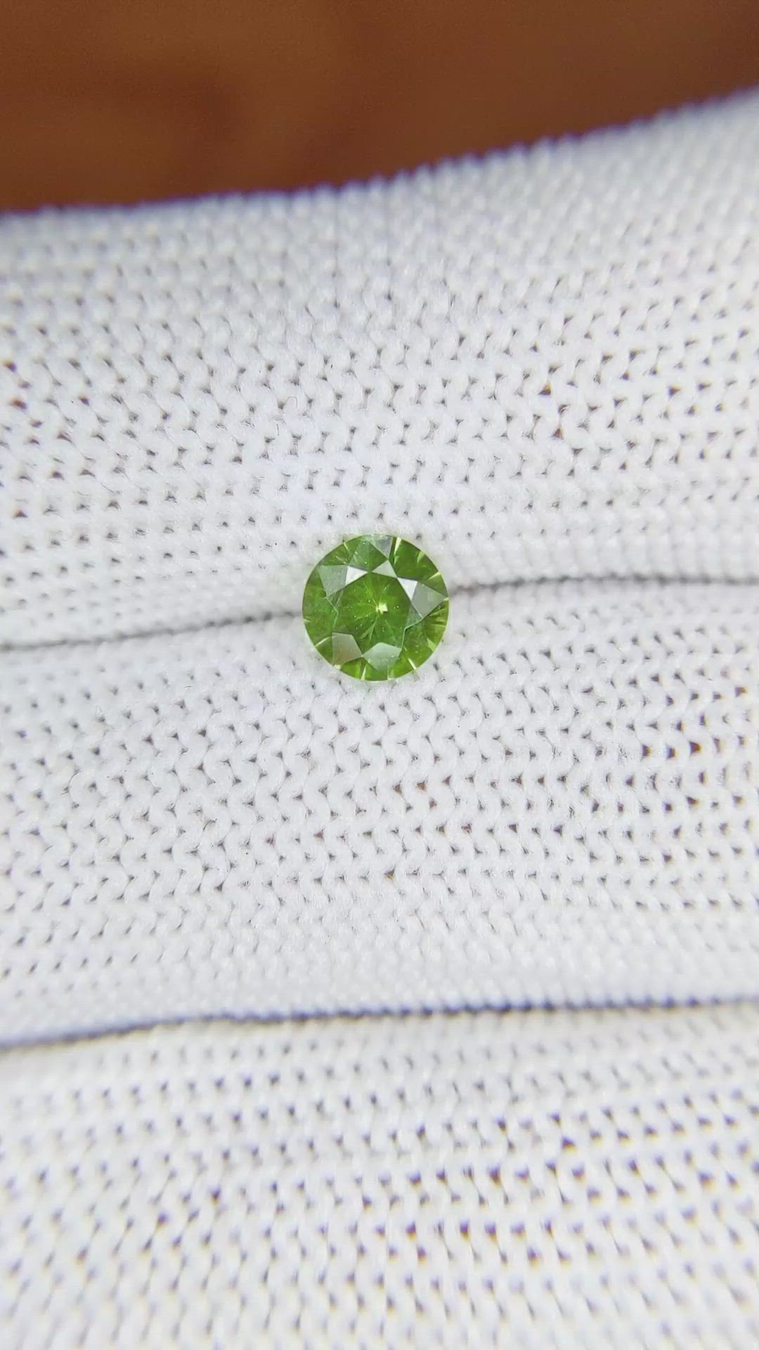 0.77 Ct. Yellowish Green Sapphire from Madagascar Size Video