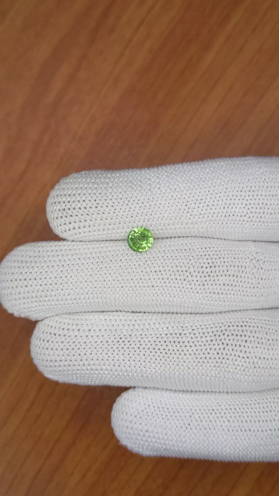 0.62 Ct. Yellowish Green Sapphire from Madagascar Size Video
