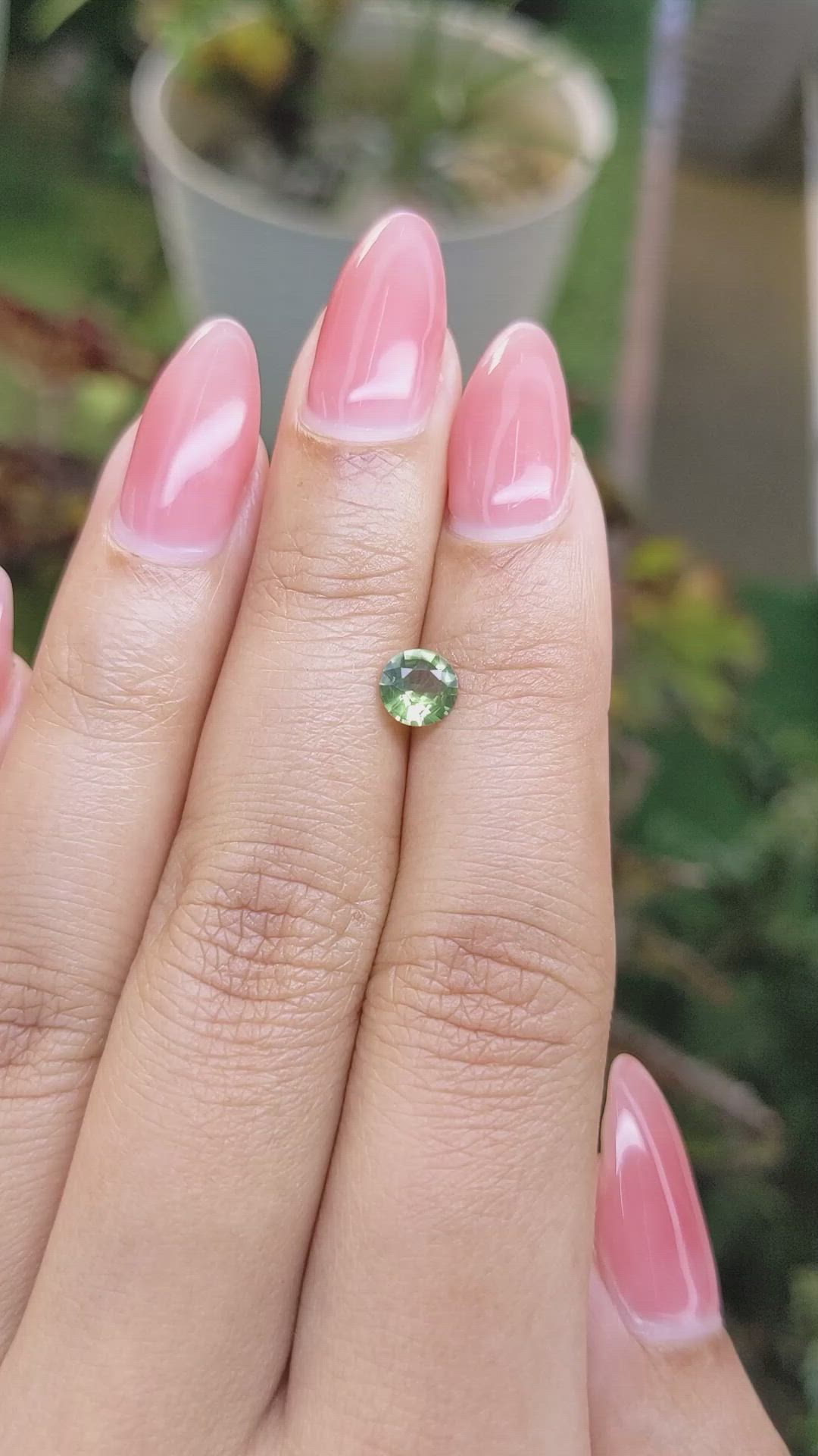 0.62 Ct. Yellowish Green Sapphire from Madagascar Size Video