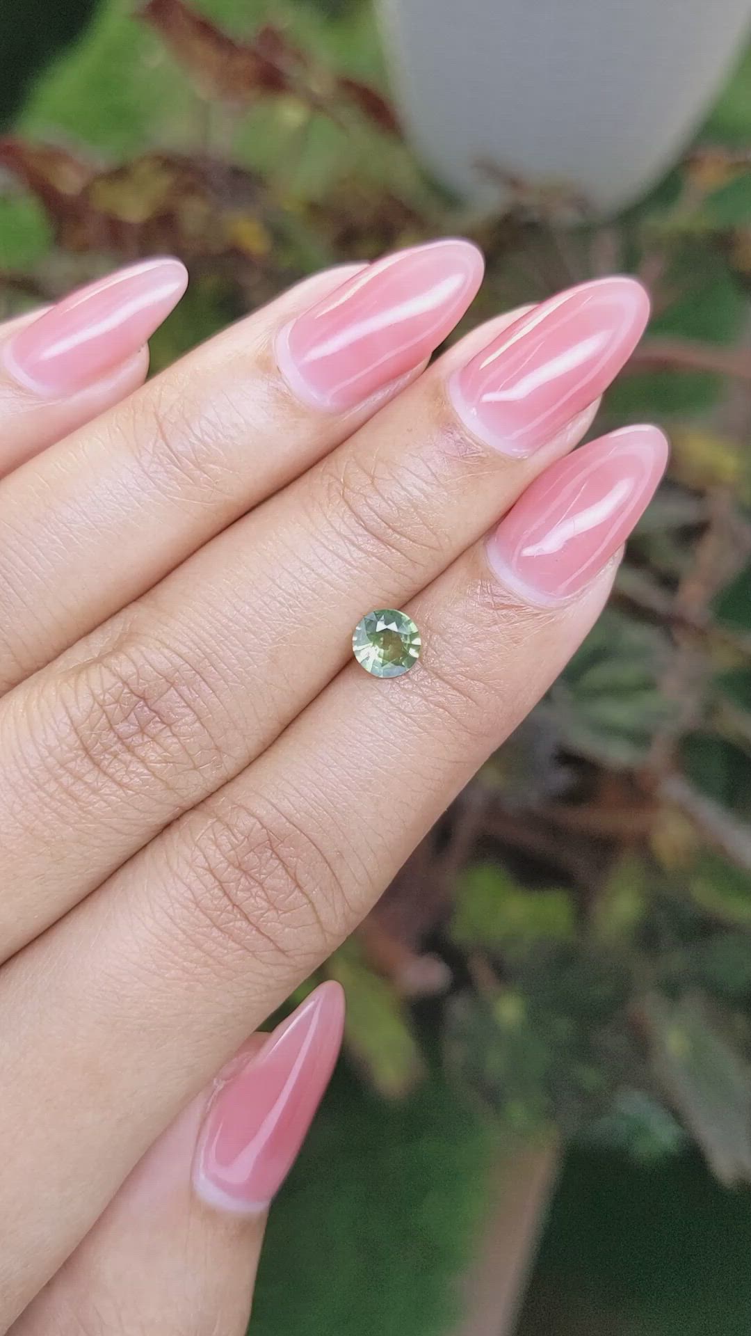 0.62 Ct. Yellowish Green Sapphire from Madagascar Size Video